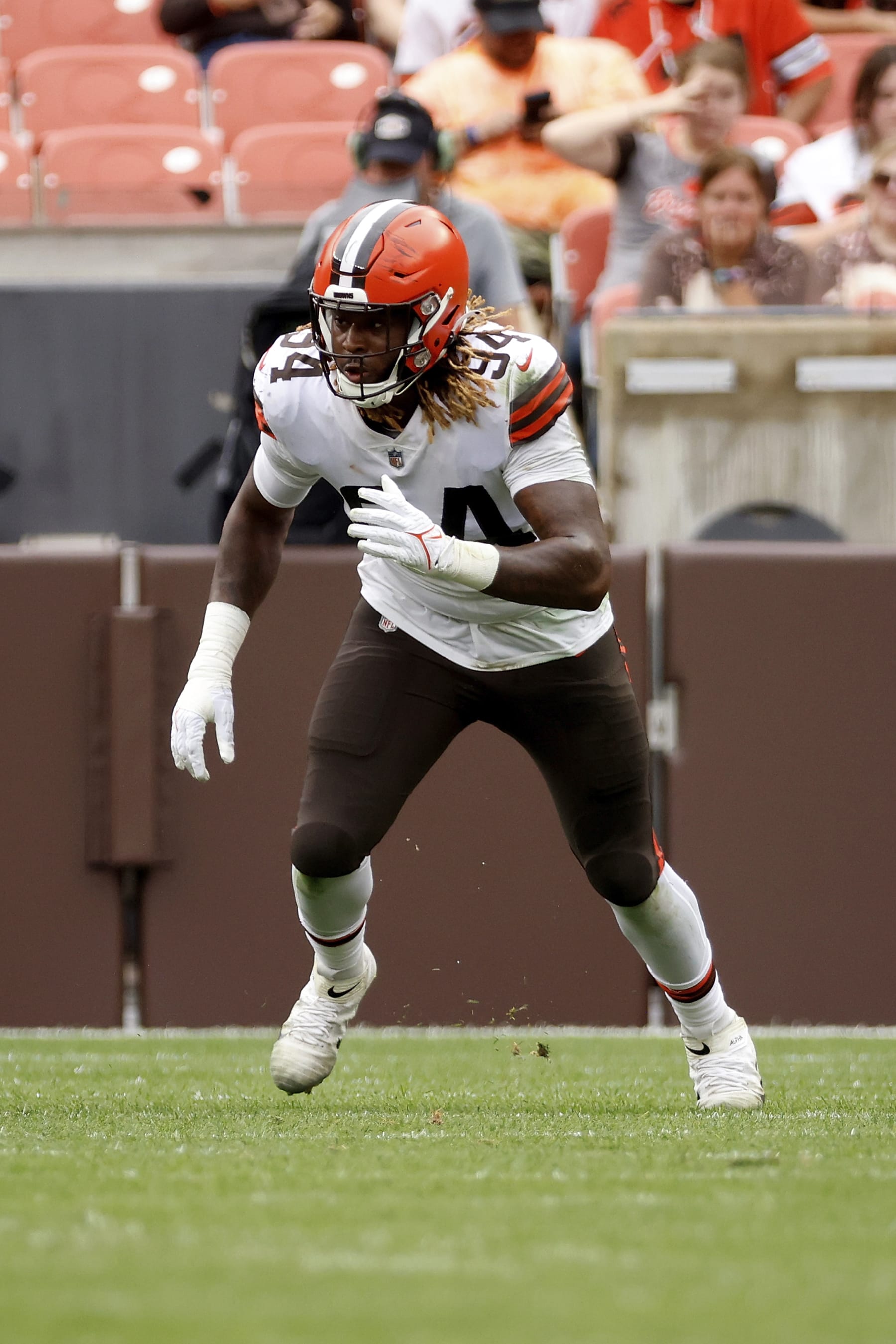 Cleveland Browns defensive end Alex Wright (94) runs off of the line of scrimmage during an NFL preseason football game against the Philadelphia Eagles, Sunday, Aug. 21, 2022, in Cleveland. (AP Photo/Kirk Irwin)