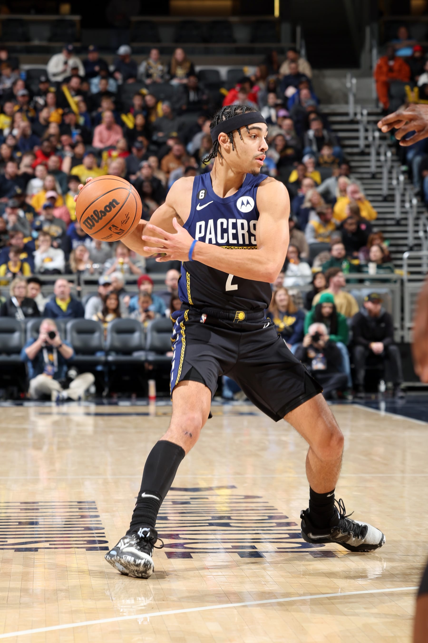 INDIANAPOLIS, IN - DECEMBER 12: Andrew Nembhard #2 of the Indiana Pacers dribbles the ball during the game against the Miami Heat on December 12, 2022 at Gainbridge Fieldhouse in Indianapolis, Indiana. NOTE TO USER: User expressly acknowledges and agrees that, by downloading and or using this Photograph, user is consenting to the terms and conditions of the Getty Images License Agreement. Mandatory Copyright Notice: Copyright 2022 NBAE (Photo by Jeff Haynes/NBAE via Getty Images)