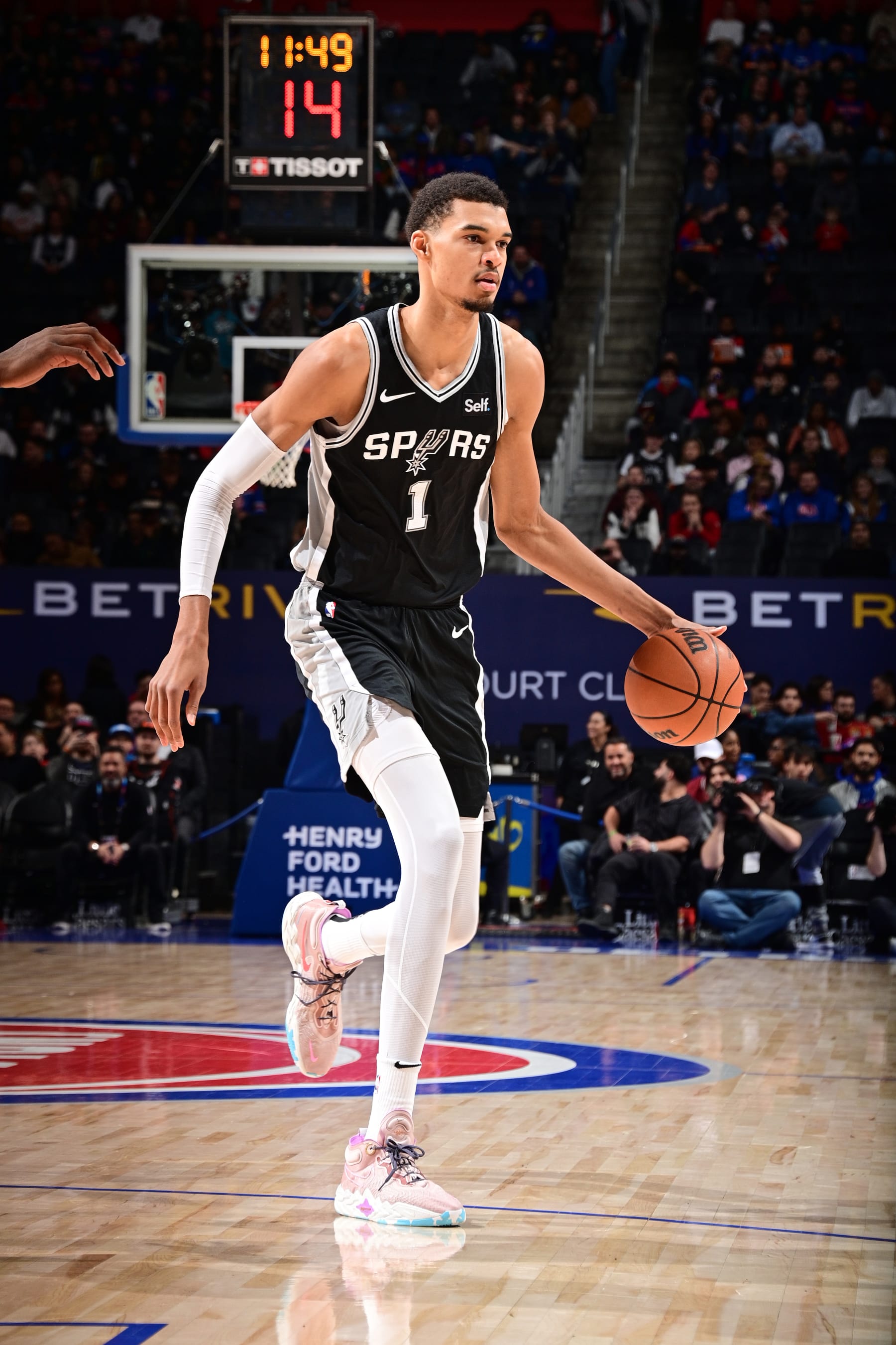 DETROIT, MI - JANUARY 10: Victor Wembanyama #1 of the San Antonio Spurs handles the ball during the game against the Detroit Pistons on January 10, 2024 at Little Caesars Arena in Detroit, Michigan. NOTE TO USER: User expressly acknowledges and agrees that, by downloading and/or using this photograph, User is consenting to the terms and conditions of the Getty Images License Agreement. Mandatory Copyright Notice: Copyright 2024 NBAE (Photo by Chris Schwegler/NBAE via Getty Images)