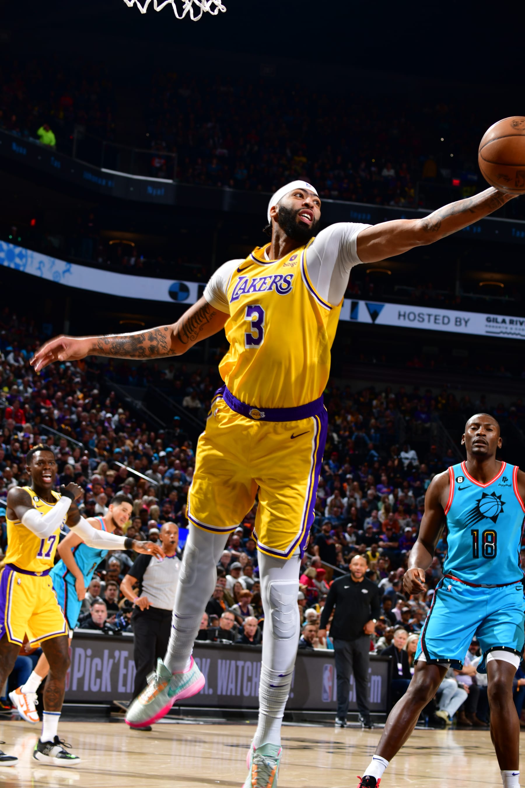PHOENIX, AZ -NOVEMBER 22: Anthony Davis #3 of the Los Angeles Lakers grabs the rebound during the game against the Phoenix Suns on November 22, 2022 at Footprint Center in Phoenix, Arizona. NOTE TO USER: User expressly acknowledges and agrees that, by downloading and or using this photograph, user is consenting to the terms and conditions of the Getty Images License Agreement. Mandatory Copyright Notice: Copyright 2022 NBAE (Photo by Barry Gossage/NBAE via Getty Images)
