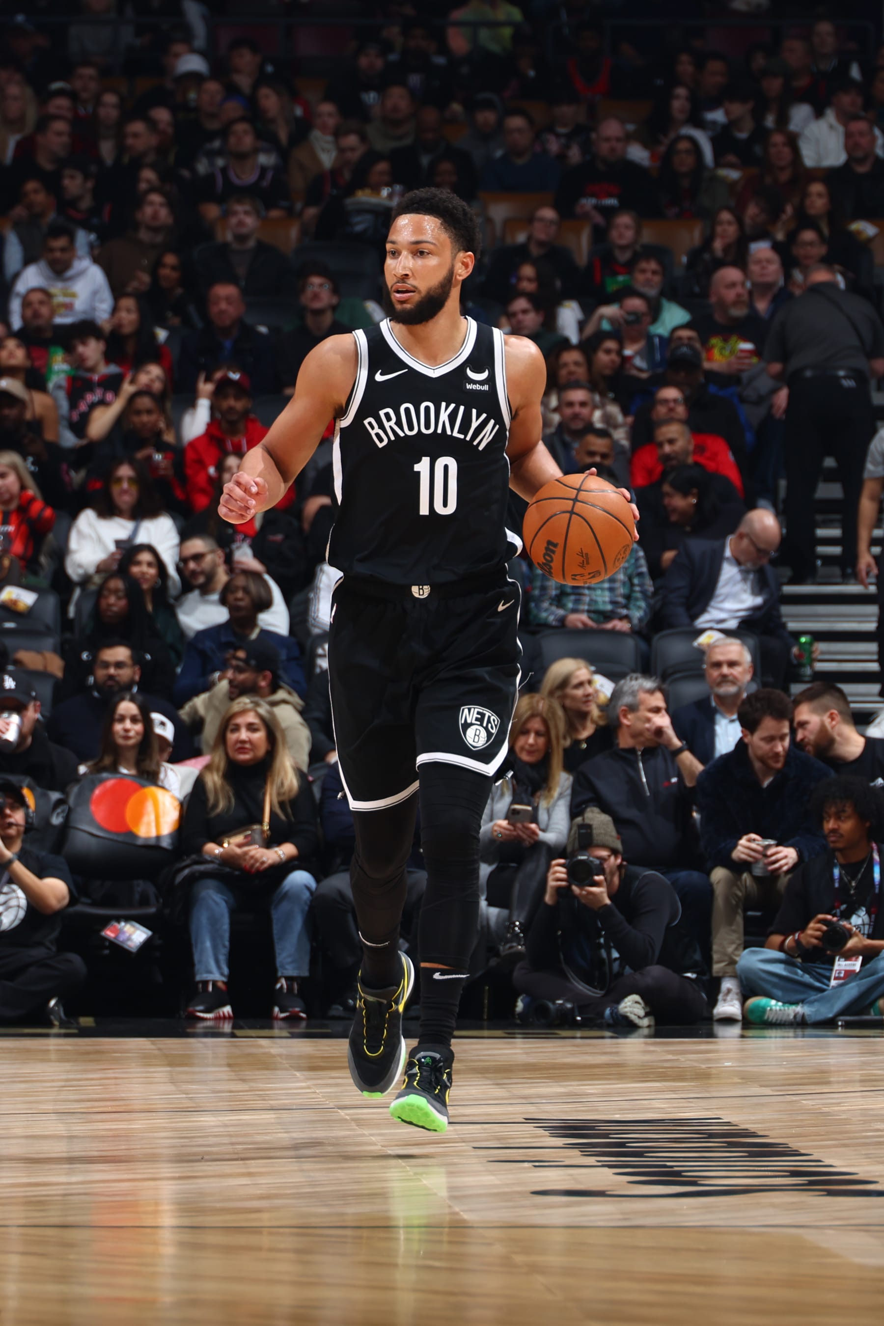 TORONTO, CANADA - FEBRUARY 22: Ben Simmons #10 of the Brooklyn Nets dribbles the ball during the game against the Toronto Raptors on February 22, 2024 at the Scotiabank Arena in Toronto, Ontario, Canada.  NOTE TO USER: User expressly acknowledges and agrees that, by downloading and or using this Photograph, user is consenting to the terms and conditions of the Getty Images License Agreement.  Mandatory Copyright Notice: Copyright 2024 NBAE (Photo by Vaughn Ridley/NBAE via Getty Images)