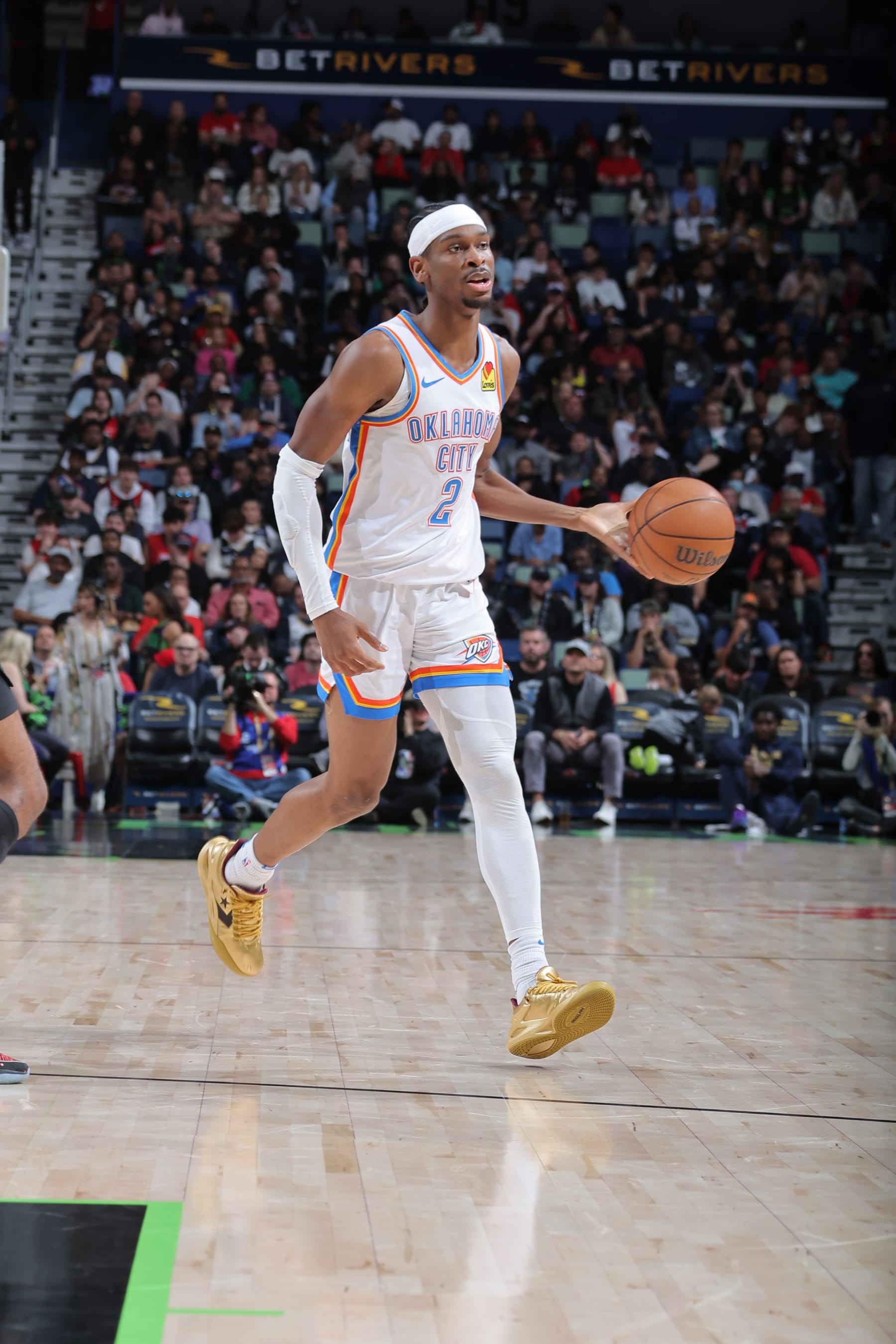 NEW ORLEANS, LA - MARCH 26: Shai Gilgeous-Alexander #2 of the Oklahoma City Thunder handles the ball during the game  on March 26, 2024 at the Smoothie King Center in New Orleans, Louisiana. NOTE TO USER: User expressly acknowledges and agrees that, by downloading and or using this Photograph, user is consenting to the terms and conditions of the Getty Images License Agreement. Mandatory Copyright Notice: Copyright 2024 NBAE (Photo by Jonathan Bachman/NBAE via Getty Images)