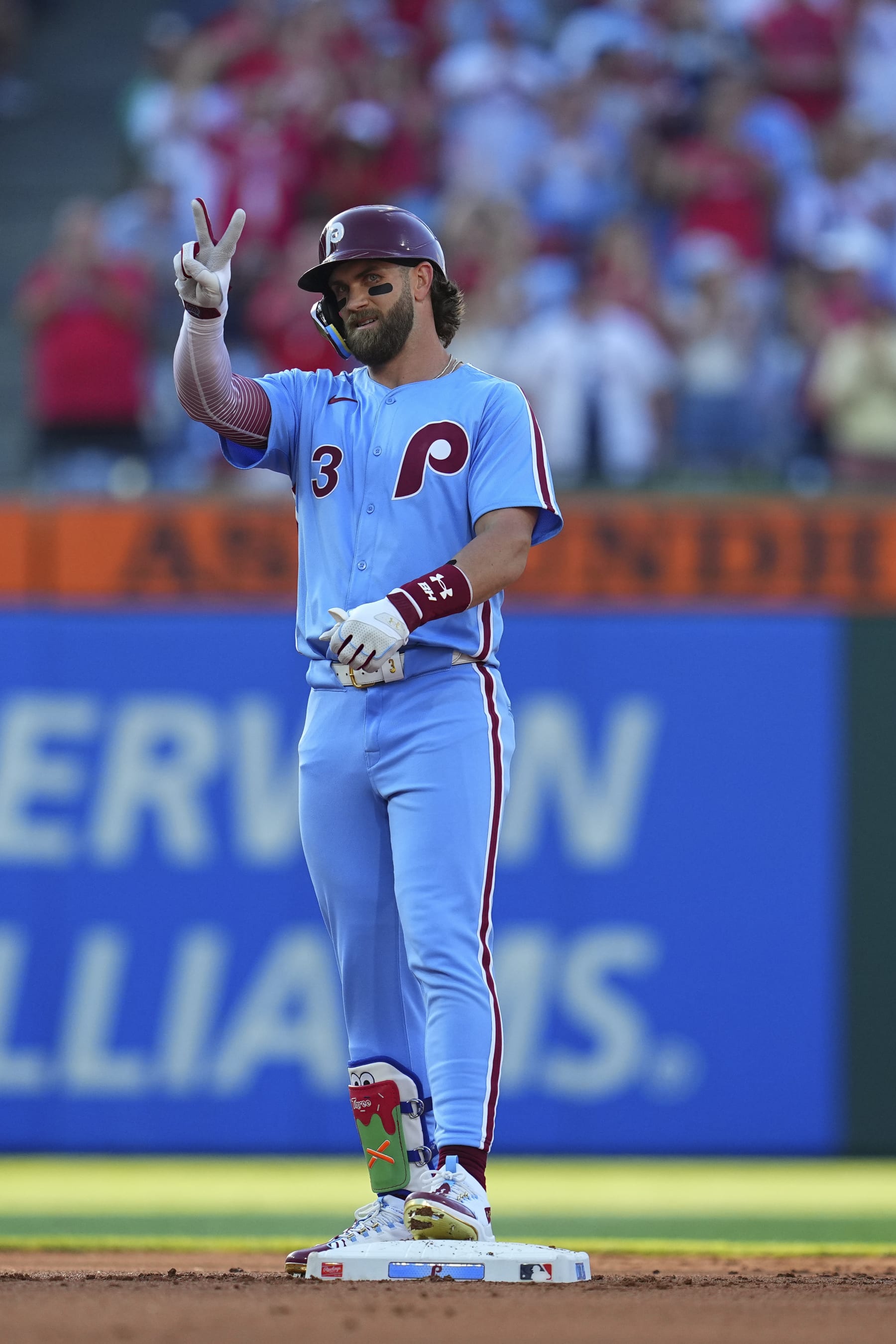 PHILADELPHIA, PENNSYLVANIA - JUNE 27: Bryce Harper #3 of the Philadelphia Phillies gestures after hitting an RBI double in the bottom of the first inning against the Miami Marlins at Citizens Bank Park on June 27, 2024 in Philadelphia, Pennsylvania. (Photo by Mitchell Leff/Getty Images)