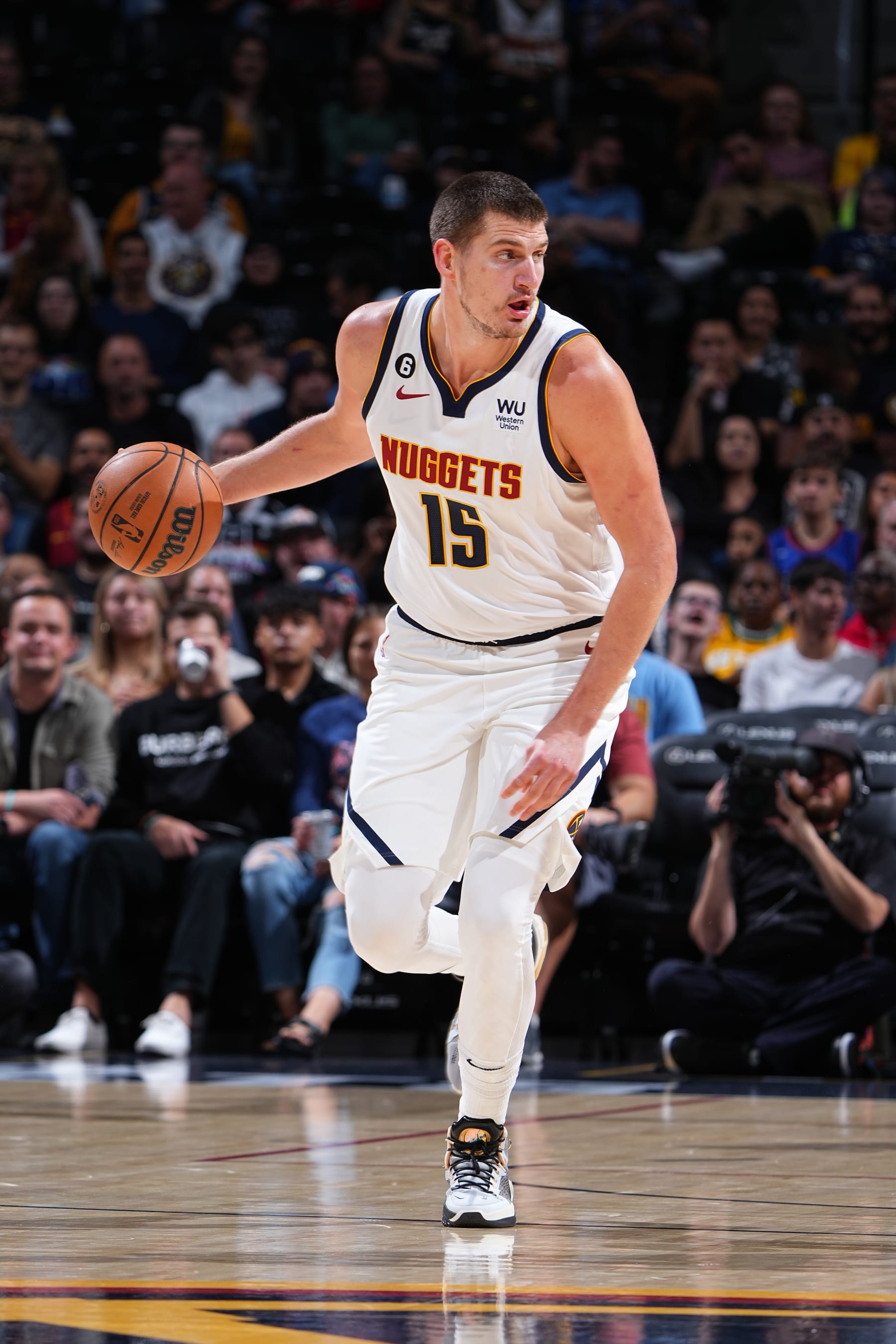 DENVER, CO - OCTOBER 3: Nikola Jokic #15 of the Denver Nuggets dribbles the ball during the game against the Oklahoma City Thunders on October 3, 2022 at the Ball Arena in Denver, Colorado. NOTE TO USER: User expressly acknowledges and agrees that, by downloading and/or using this Photograph, user is consenting to the terms and conditions of the Getty Images License Agreement. Mandatory Copyright Notice: Copyright 2022 NBAE (Photo by Garrett Ellwood/NBAE via Getty Images)
