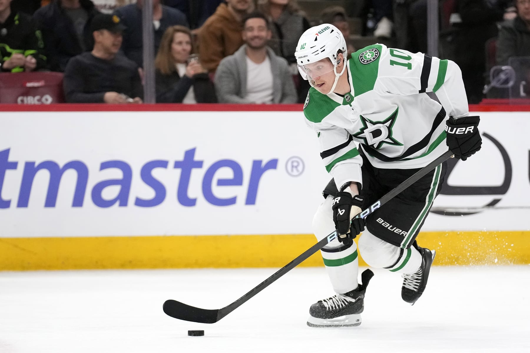 CHICAGO, ILLINOIS - APRIL 06: Ty Dellandrea #10 of the Dallas Stars skates with the puck during the second period against the Chicago Blackhawks at the United Center on April 06, 2024 in Chicago, Illinois. (Photo by Patrick McDermott/Getty Images)
