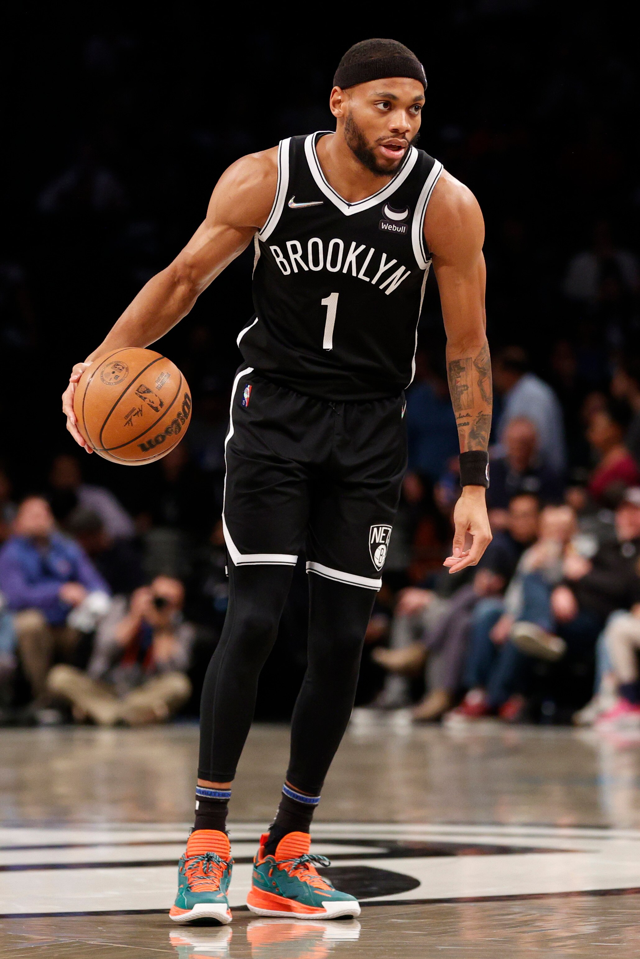 NEW YORK, NEW YORK - APRIL 12: Bruce Brown #1 of the Brooklyn Nets dribbles during the first half of the Eastern Conference 2022 Play-In Tournament against the Cleveland Cavaliers at Barclays Center on April 12, 2022 in the Brooklyn borough of New York City. NOTE TO USER: User expressly acknowledges and agrees that, by downloading and or using this photograph, User is consenting to the terms and conditions of the Getty Images License Agreement. (Photo by Sarah Stier/Getty Images)
