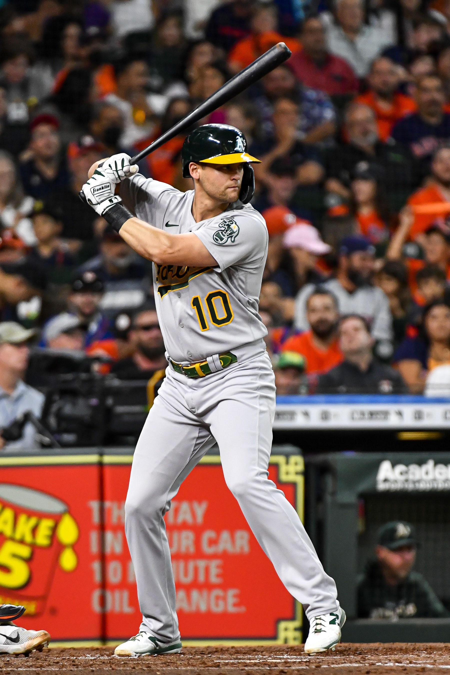 HOUSTON, TEXAS - JULY 15: Chad Pinder #10 of the Oakland Athletics bats against the Houston Astros at Minute Maid Park on July 15, 2022 in Houston, Texas. (Photo by Logan Riely/Getty Images)
