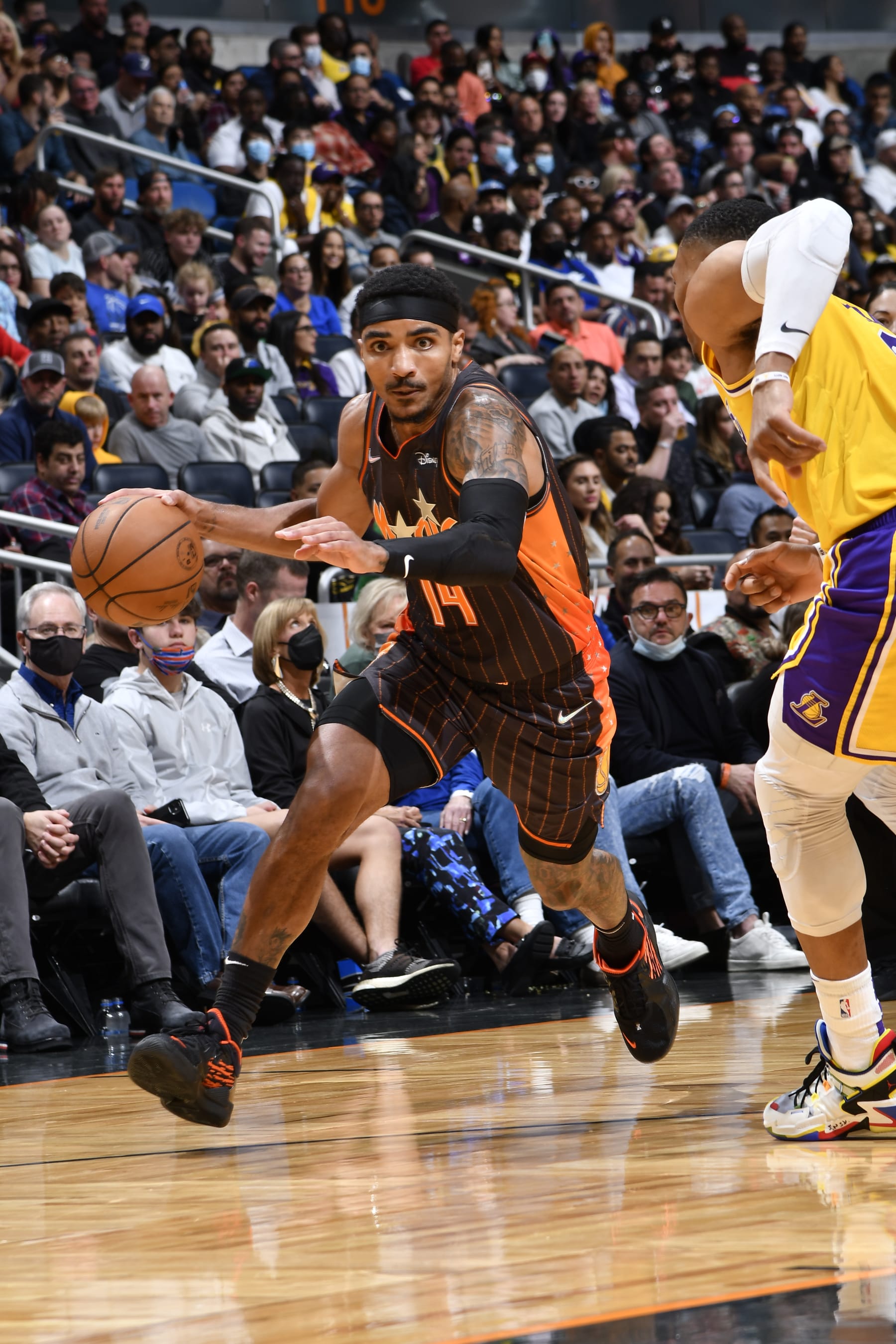ORLANDO, FL - JANUARY 21: Gary Harris #14 of the Orlando Magic dribbles the ball during the game against the Los Angeles Lakers on January 21, 2022 at Amway Center in Orlando, Florida. NOTE TO USER: User expressly acknowledges and agrees that, by downloading and or using this photograph, User is consenting to the terms and conditions of the Getty Images License Agreement. Mandatory Copyright Notice: Copyright 2022 NBAE (Photo by Fernando Medina/NBAE via Getty Images)