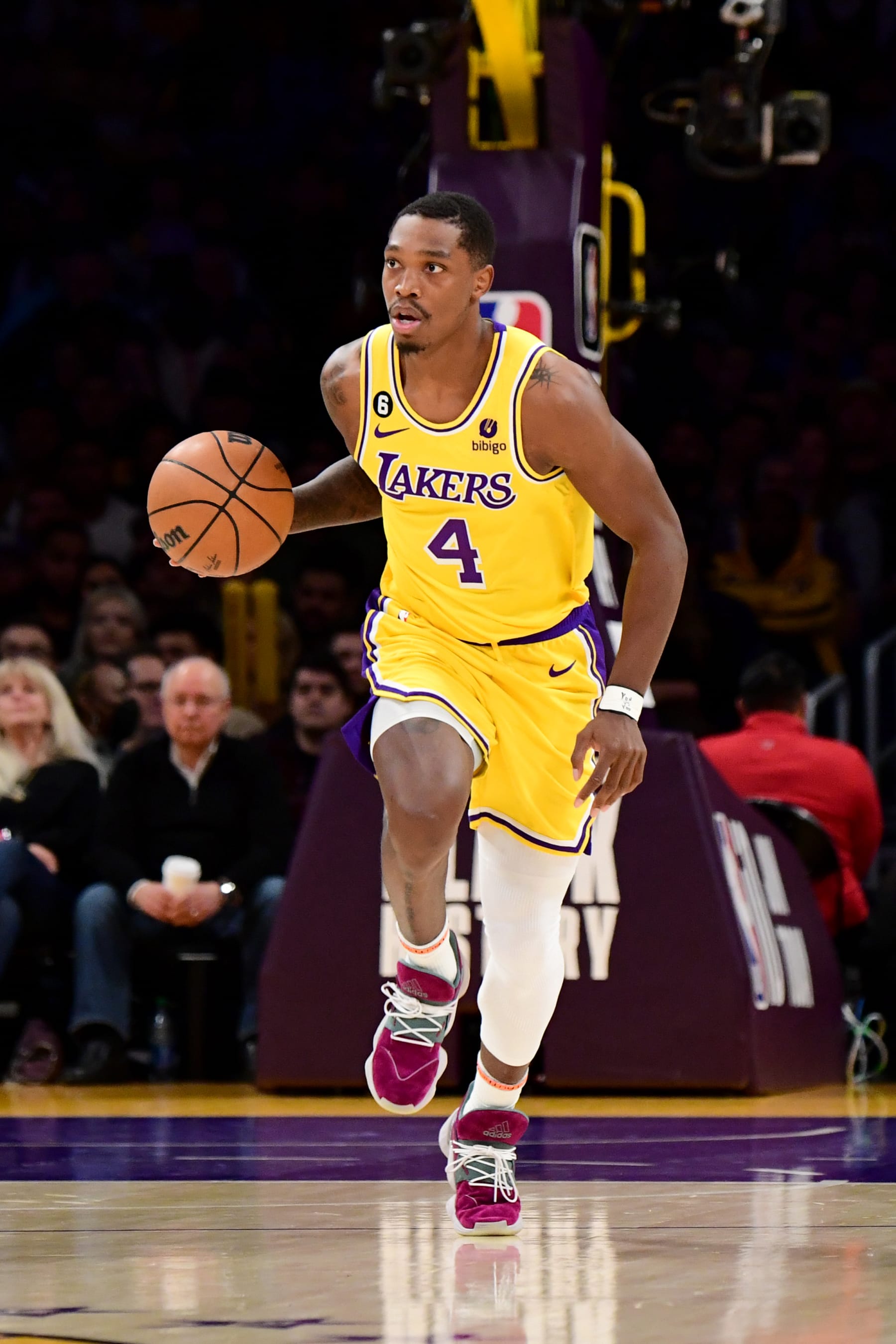 LOS ANGELES, CA - FEBRUARY 9: Lonnie Walker IV #4 of the Los Angeles Lakers dribbles the ball during the game against the Milwaukee Bucks on February 9, 2023 at Crypto.Com Arena in Los Angeles, California. NOTE TO USER: User expressly acknowledges and agrees that, by downloading and/or using this Photograph, user is consenting to the terms and conditions of the Getty Images License Agreement. Mandatory Copyright Notice: Copyright 2023 NBAE (Photo by Adam Pantozzi/NBAE via Getty Images)