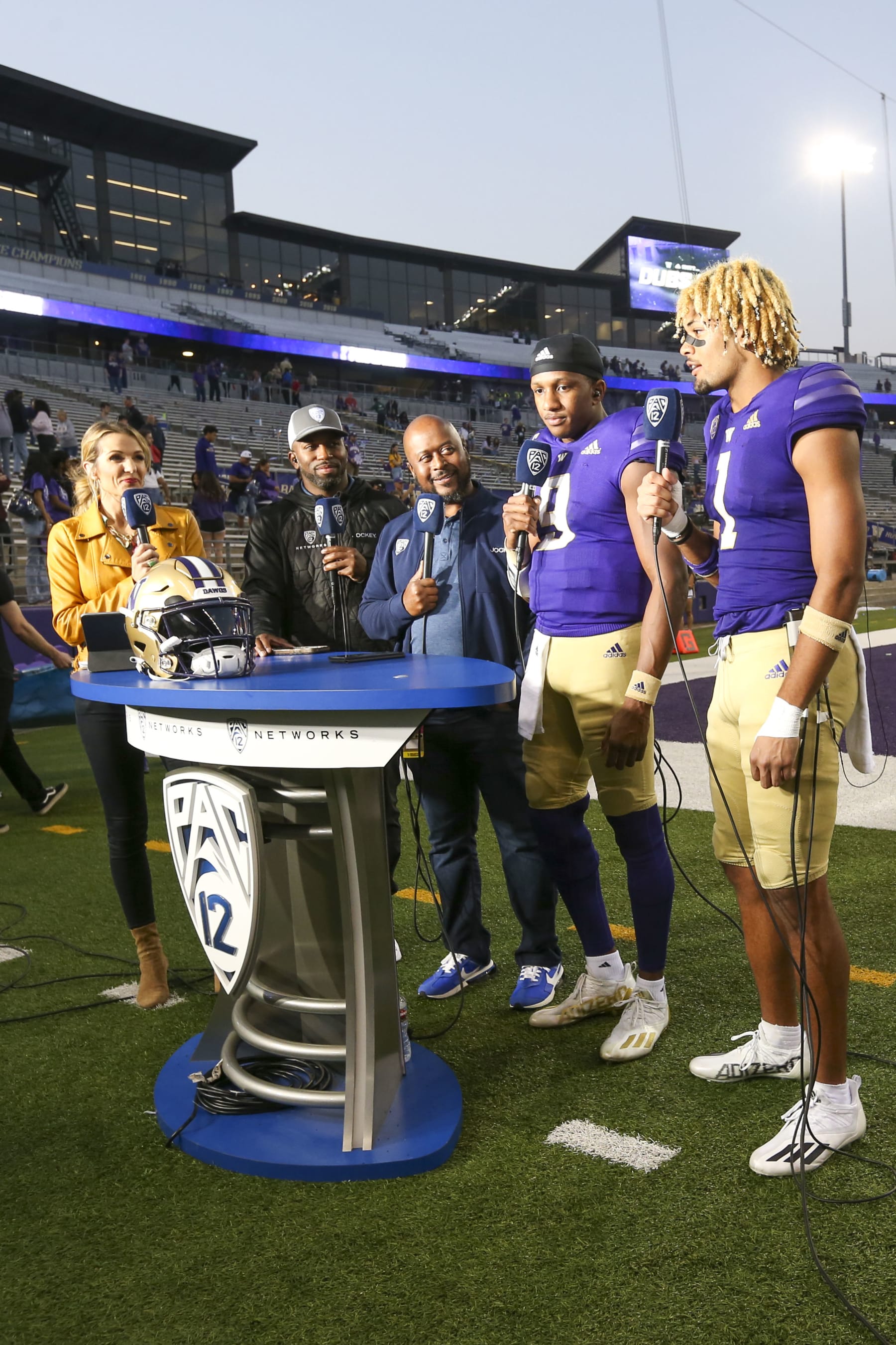 SEATTLE, WA - OCTOBER 15: Washington players #9 (QB) Michael Penix Jr and #1 (WR) Rome Odunze do an interview with the Pac-12 Network after  a college football game between the Washington Huskies and the Arizona Wildcats on October 15, 2022 at Husky Stadium in Seattle, WA. (Photo by Jesse Beals/Icon Sportswire via Getty Images)
