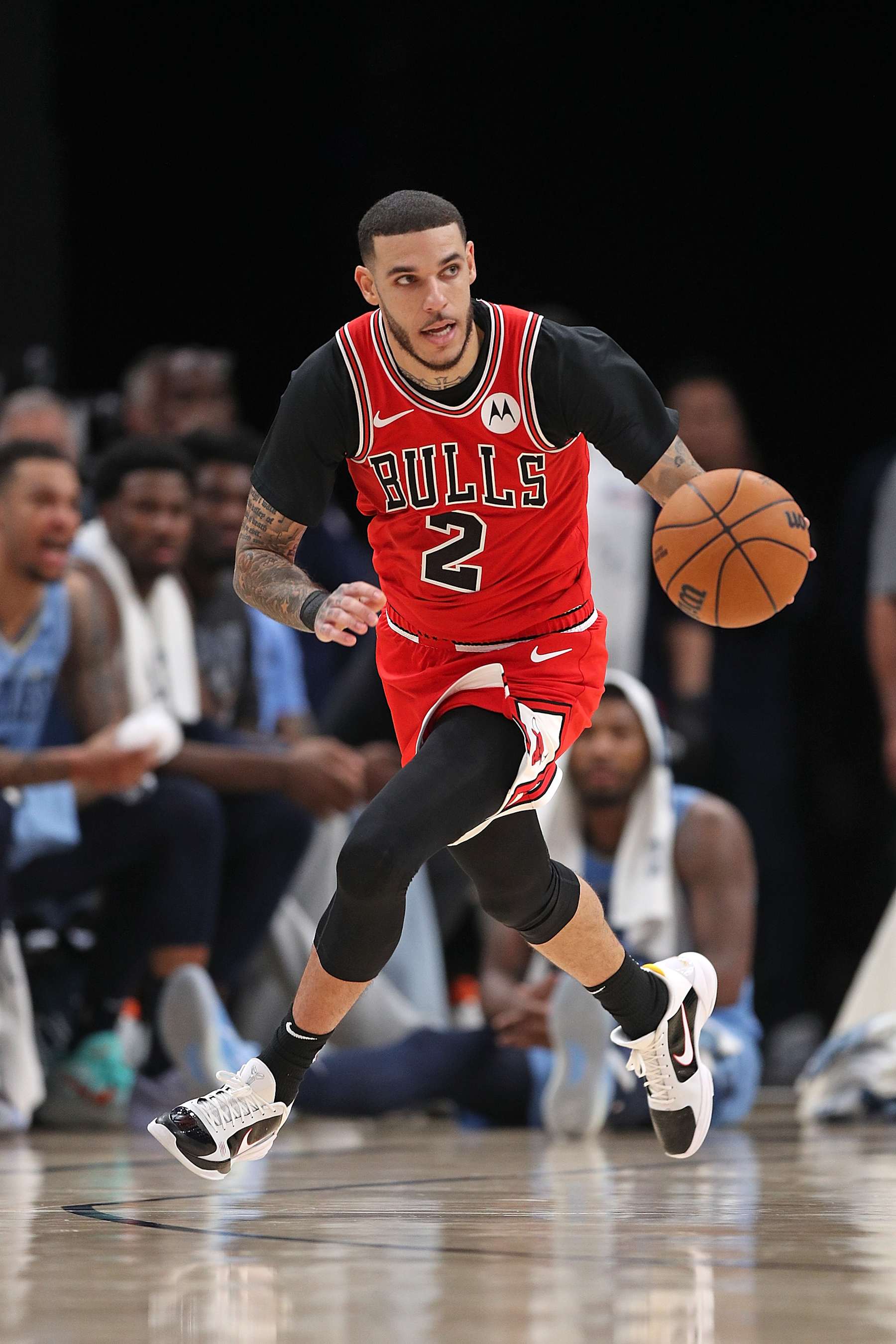 MEMPHIS, TENNESSEE - OCTOBER 28: Lonzo Ball #2 of the Chicago Bulls brings the ball up court during the game against the Memphis Grizzlies at FedExForum on October 28, 2024 in Memphis, Tennessee. NOTE TO USER: User expressly acknowledges and agrees that, by downloading and or using this photograph, User is consenting to the terms and conditions of the Getty Images License Agreement. (Photo by Justin Ford/Getty Images)