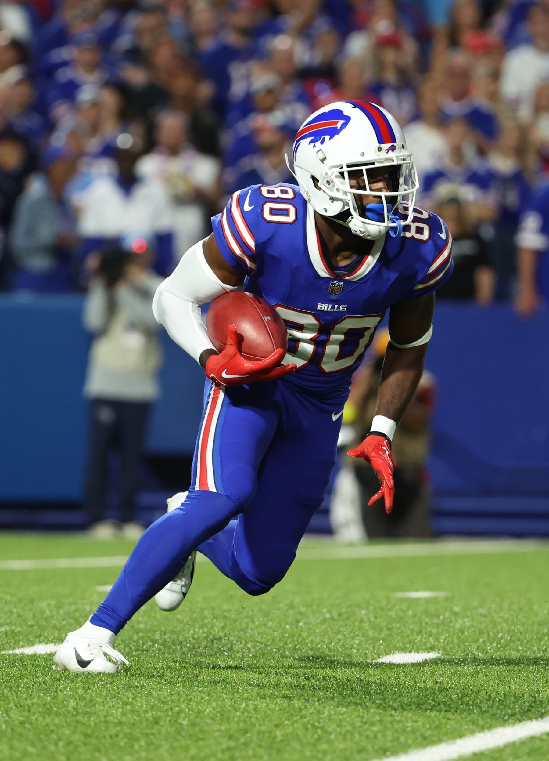 ORCHARD PARK, NY - SEPTEMBER 19: Jamison Crowder #80 of the Buffalo Bills runs the ball back after a kickoff against the Tennessee Titans at Highmark Stadium on September 19, 2022 in Orchard Park, New York. (Photo by Timothy T Ludwig/Getty Images)