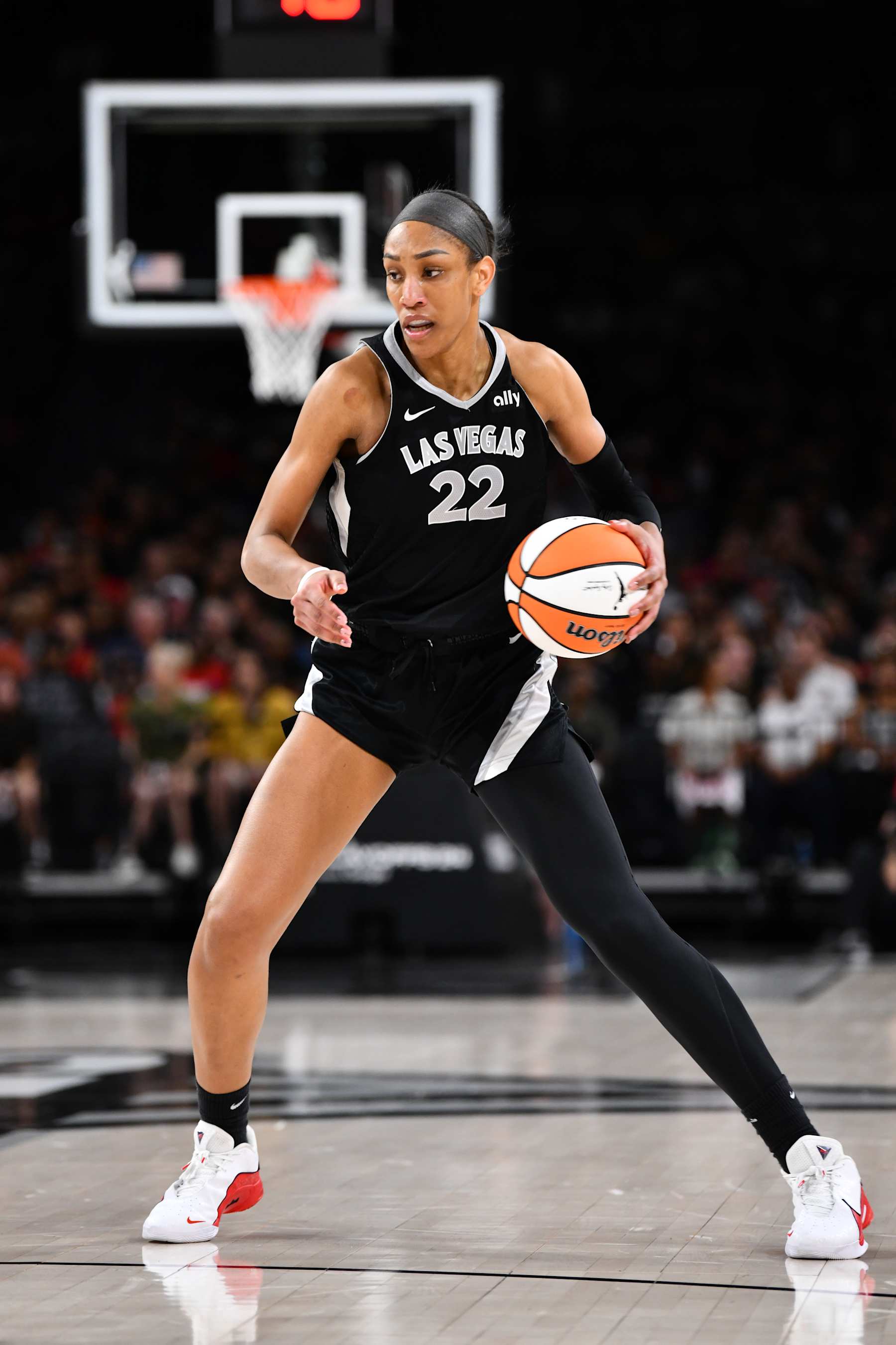 LAS VEGAS, NV - OCTOBER 4: A'ja Wilson #22 of the Las Vegas Aces dribbles the ball during the game against the New York Liberty during Round Two Game Three of the 2024 WNBA Playoffs on October 4, 2024 at Michelob ULTRA Arena in Las Vegas, Nevada. NOTE TO USER: User expressly acknowledges and agrees that, by downloading and or using this photograph, user is consenting to the terms and conditions of the Getty Images License Agreement. Mandatory Copyright Notice: Copyright 2024 NBAE (Photo by Barry Gossage/NBAE via Getty Images)