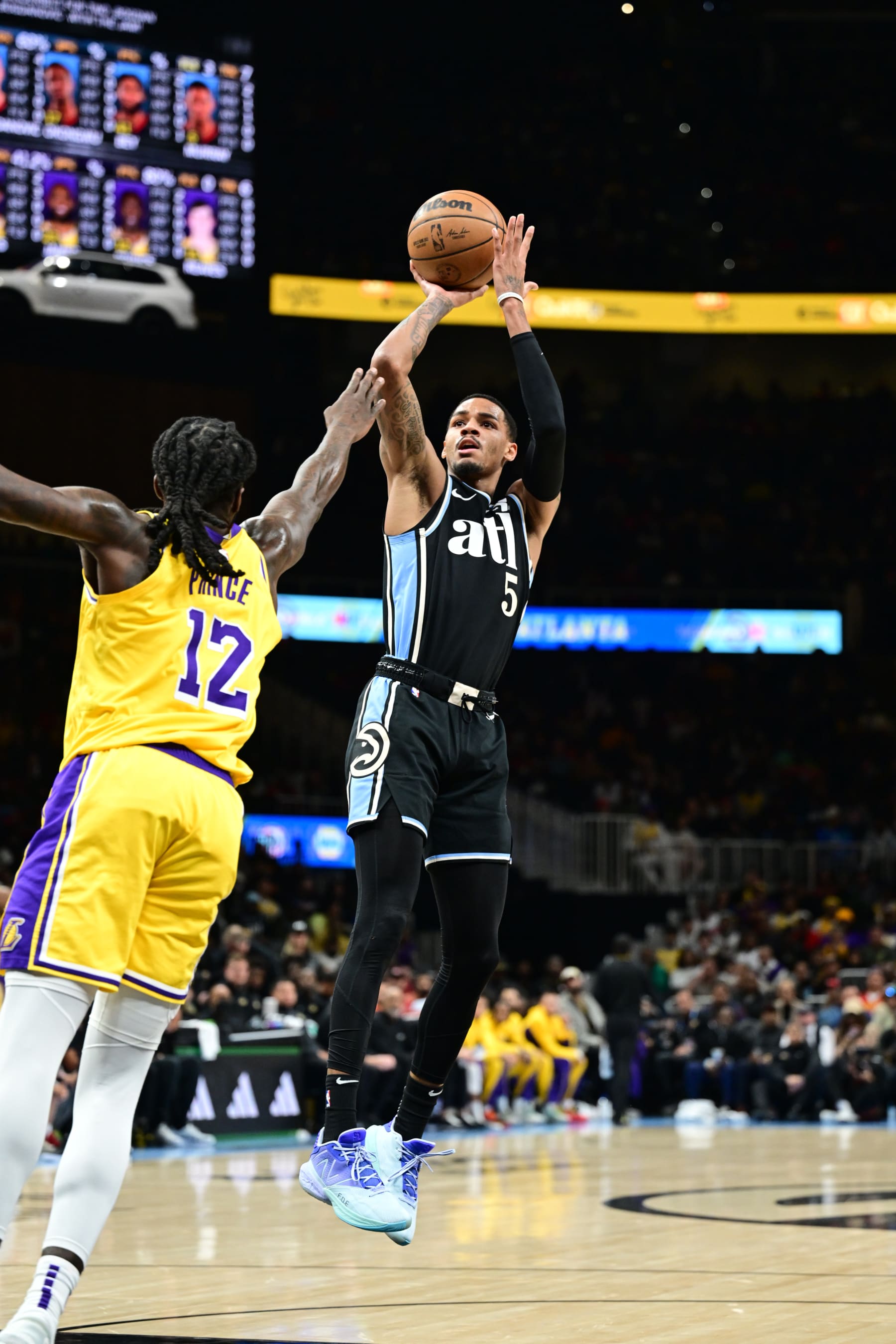 ATLANTA, GA - JANUARY 30: Dejounte Murray #5 of the Atlanta Hawks shoots the ball during the game  against the Los Angeles Lakers on January 30, 2024 at State Farm Arena in Atlanta, Georgia.  NOTE TO USER: User expressly acknowledges and agrees that, by downloading and/or using this Photograph, user is consenting to the terms and conditions of the Getty Images License Agreement. Mandatory Copyright Notice: Copyright 2024 NBAE (Photo by Adam Hagy/NBAE via Getty Images)