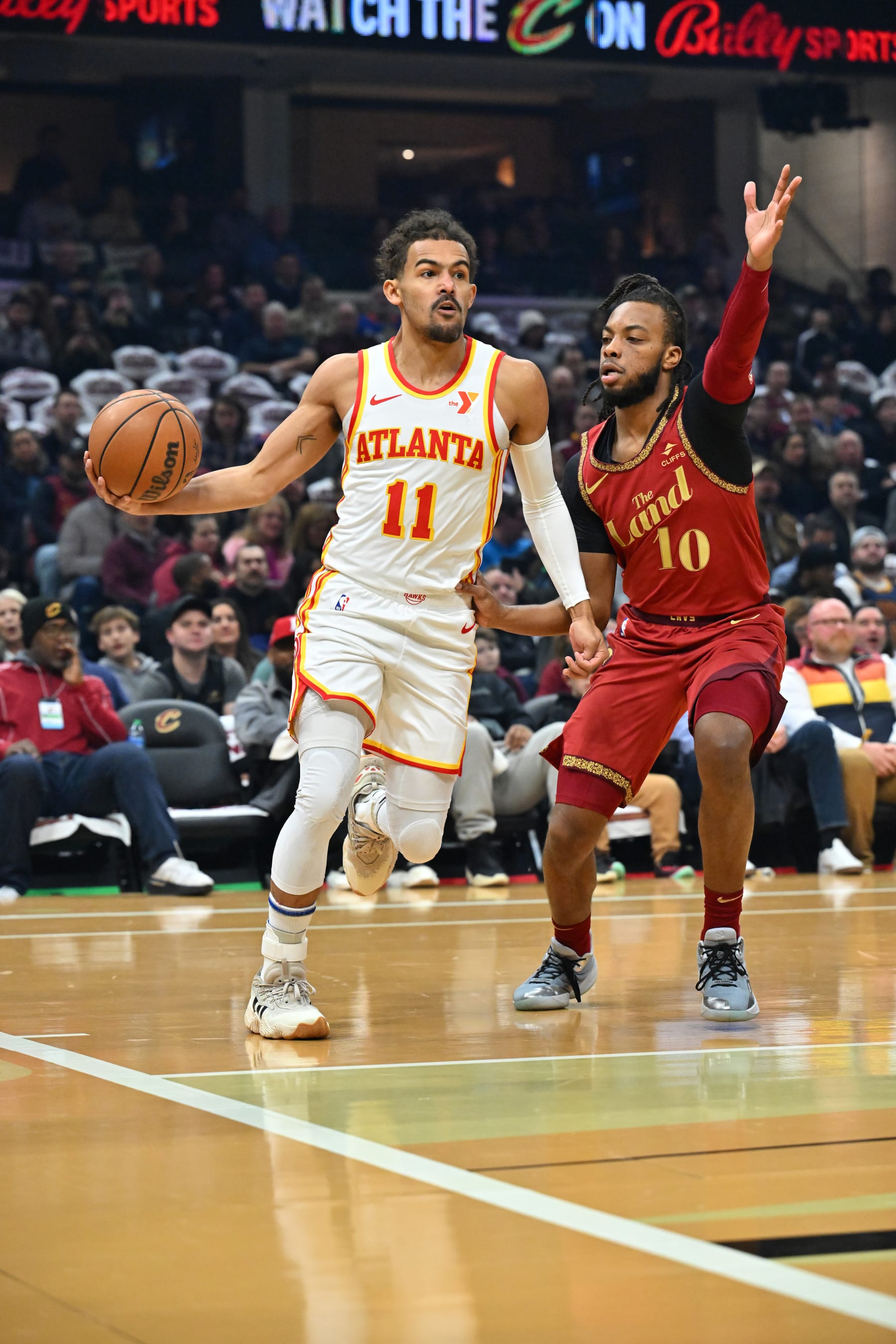 CLEVELAND, OHIO - NOVEMBER 28: Trae Young #11 of the Atlanta Hawks drives to the basket around Darius Garland #10 of the Cleveland Cavaliers during the first half of an NBA In-Season Tournament game at Rocket Mortgage Fieldhouse on November 28, 2023 in Cleveland, Ohio. NOTE TO USER: User expressly acknowledges and agrees that, by downloading and or using this photograph, User is consenting to the terms and conditions of the Getty Images License Agreement. (Photo by Jason Miller/Getty Images)
