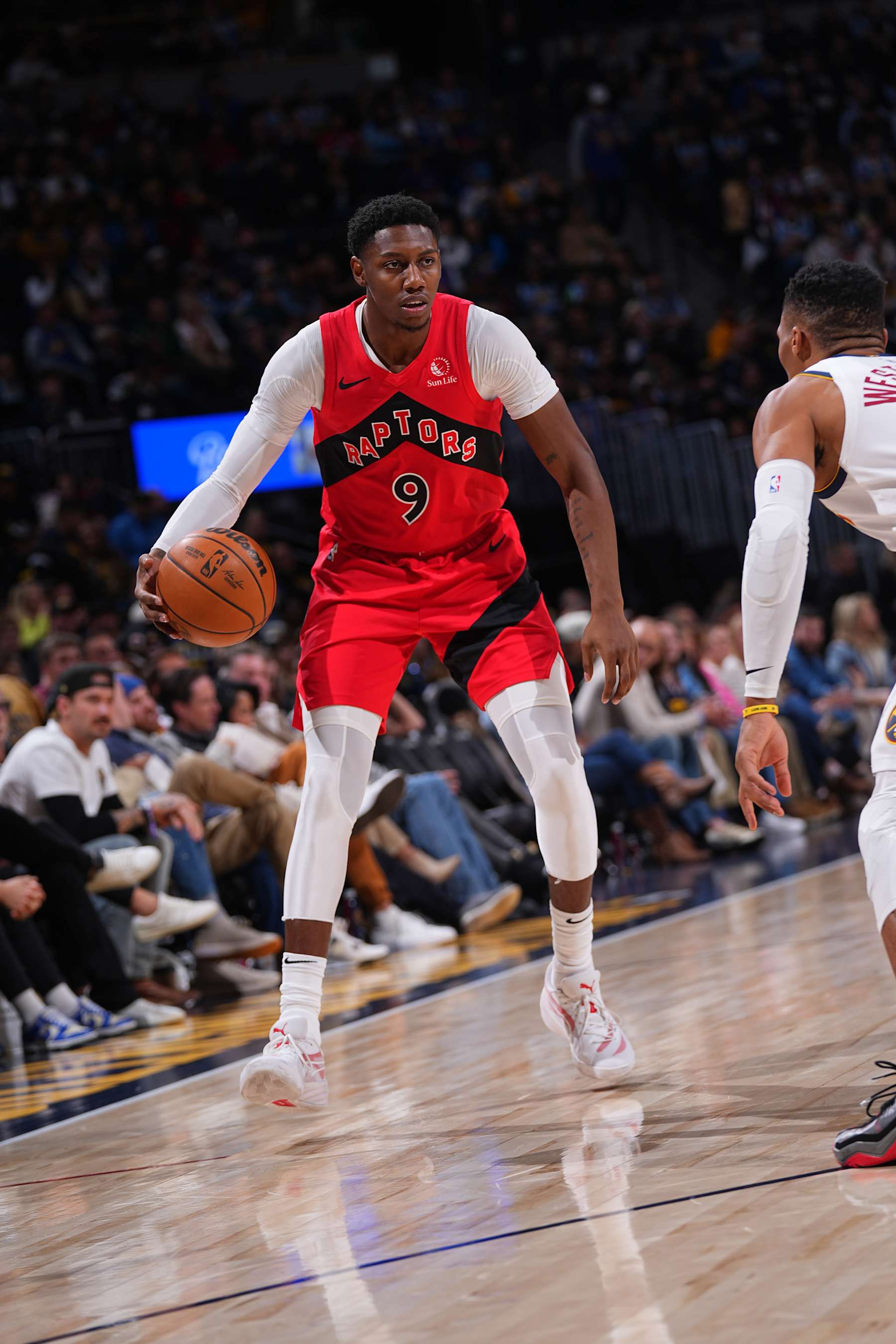 DENVER, CO - NOVEMBER 4: RJ Barrett #9 of the Toronto Raptors dribbles the ball during the game against the Denver Nuggets on November 4, 2024 at Ball Arena in Denver, Colorado. NOTE TO USER: User expressly acknowledges and agrees that, by downloading and/or using this Photograph, user is consenting to the terms and conditions of the Getty Images License Agreement. Mandatory Copyright Notice: Copyright 2024 NBAE (Photo by Bart Young/NBAE via Getty Images)