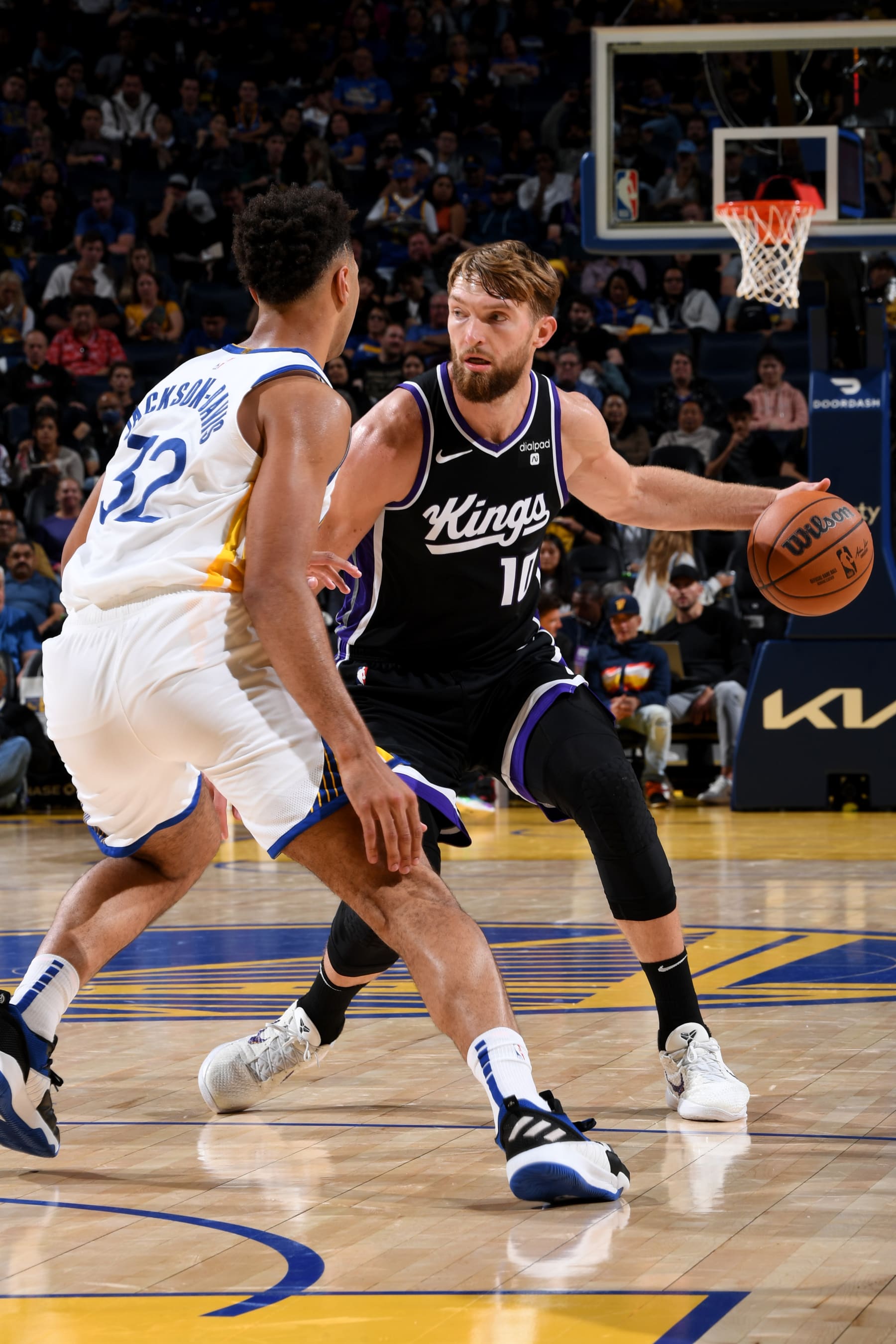 SAN FRANCISCO, CA - OCTOBER 18: Domantas Sabonis #10 of the Sacramento Kings dribbles the ball during the game against the Golden State Warriors on October 18, 2023 at Chase Center in San Francisco, California. NOTE TO USER: User expressly acknowledges and agrees that, by downloading and or using this photograph, user is consenting to the terms and conditions of Getty Images License Agreement. Mandatory Copyright Notice: Copyright 2023 NBAE (Photo by Noah Graham/NBAE via Getty Images)