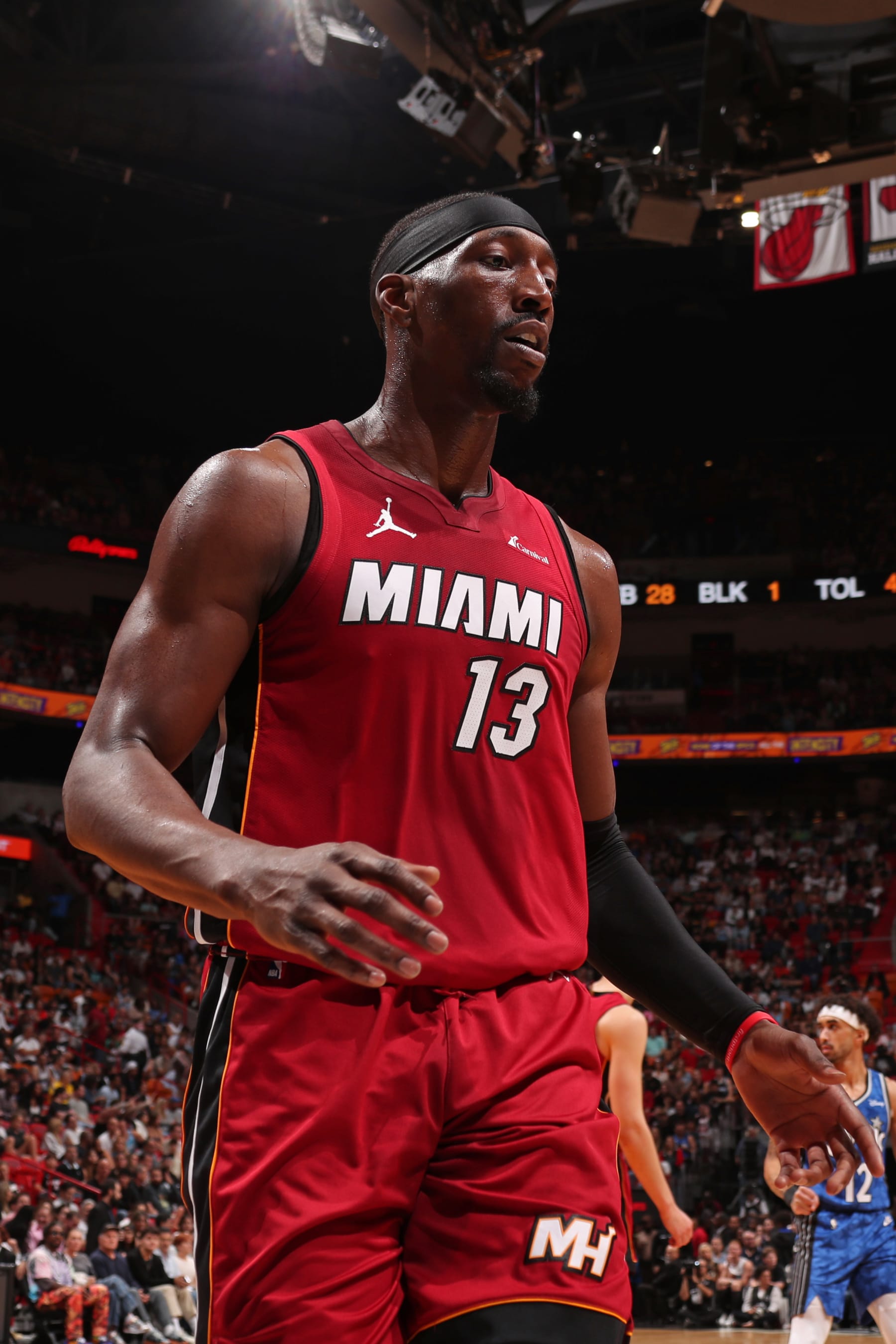 MIAMI, FL - JANUARY 12: Bam Adebayo #13 of the Miami Heat looks on during the game against the Orlando Magic on January 12, 2024 NBAE at Kaseya Center in Miami, Florida. NOTE TO USER: User expressly acknowledges and agrees that, by downloading and or using this Photograph, user is consenting to the terms and conditions of the Getty Images License Agreement. Mandatory Copyright Notice: Copyright 2024 NBAE (Photo by Issac Baldizon/NBAE via Getty Images)