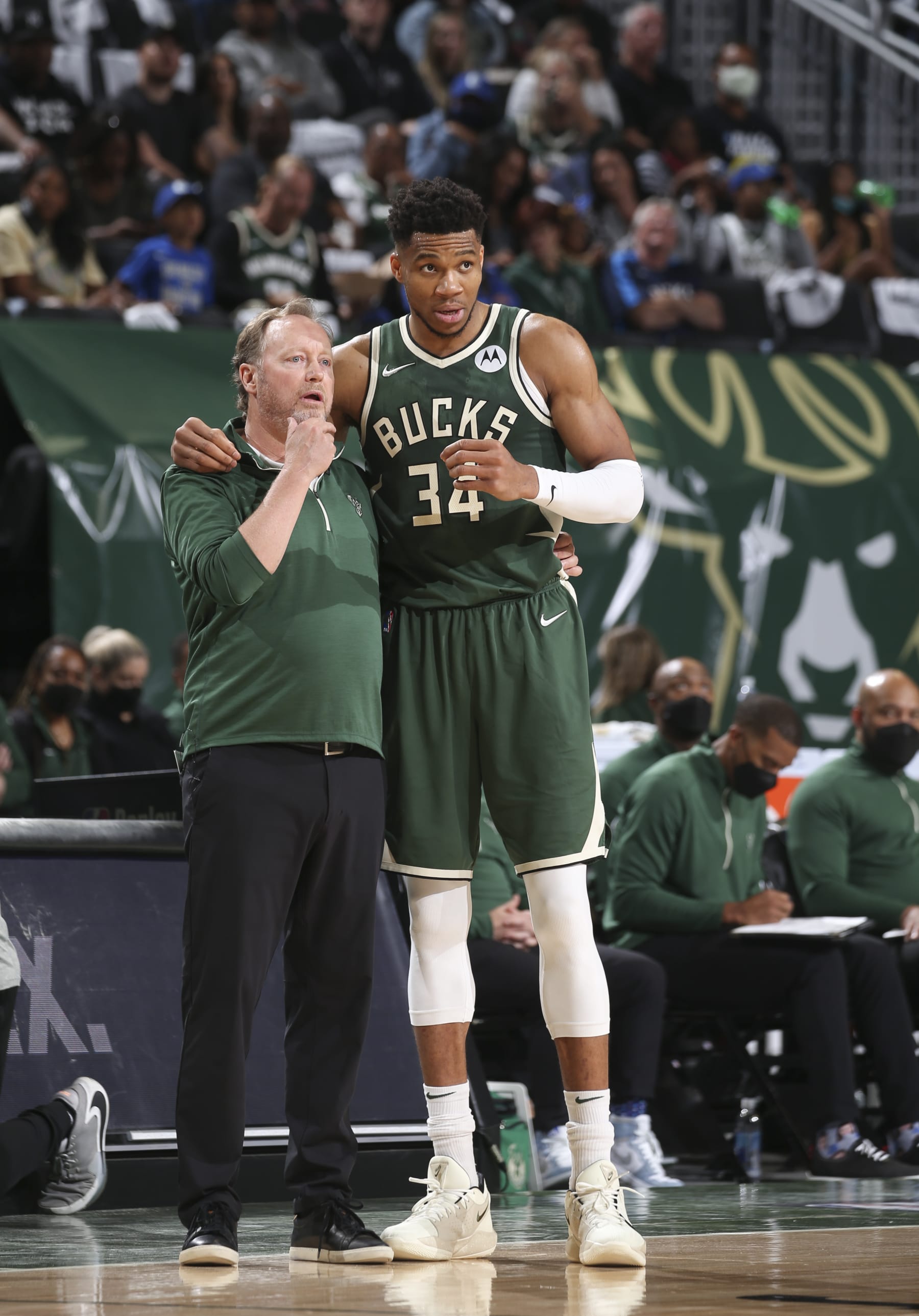 MILWAUKEE, WI - JUNE 23: Head Coach Mike Budenholzer of the Milwaukee Bucks talks to Giannis Antetokounmpo #34 of the Milwaukee Bucks during the game against the Atlanta Hawks during Game 1 of the Eastern Conference Finals of the 2021 NBA Playoffs on June 23, 2021 at the Fiserv Forum Center in Milwaukee, Wisconsin. NOTE TO USER: User expressly acknowledges and agrees that, by downloading and or using this Photograph, user is consenting to the terms and conditions of the Getty Images License Agreement. Mandatory Copyright Notice: Copyright 2021 NBAE (Photo by Gary Dineen/NBAE via Getty Images).