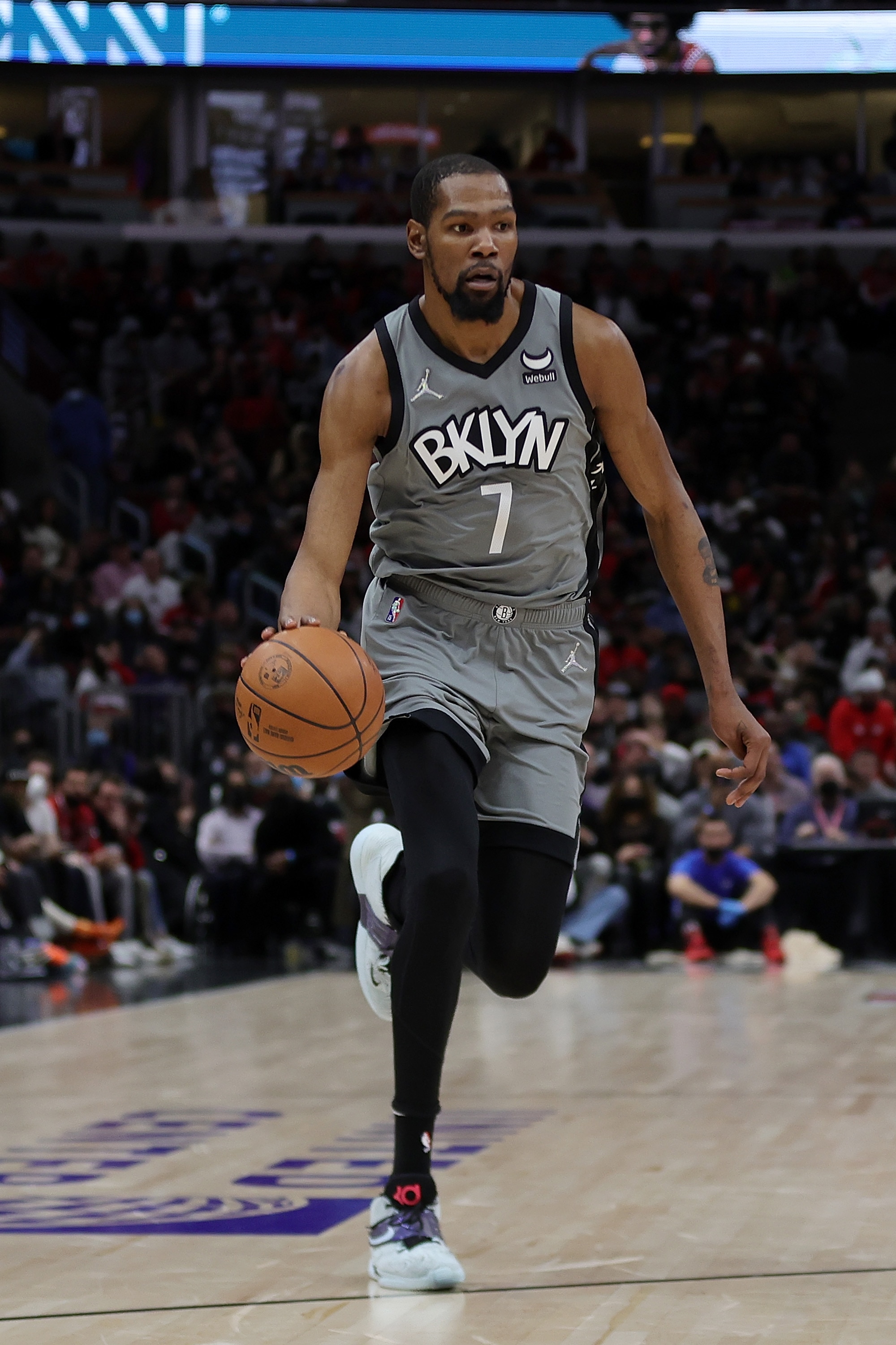CHICAGO, ILLINOIS - JANUARY 12: Kevin Durant #7 of the Brooklyn Nets handles the ball during a game against the Chicago Bulls at United Center on January 12, 2022 in Chicago, Illinois. NOTE TO USER: User expressly acknowledges and agrees that, by downloading and or using this photograph, User is consenting to the terms and conditions of the Getty Images License Agreement. (Photo by Stacy Revere/Getty Images)