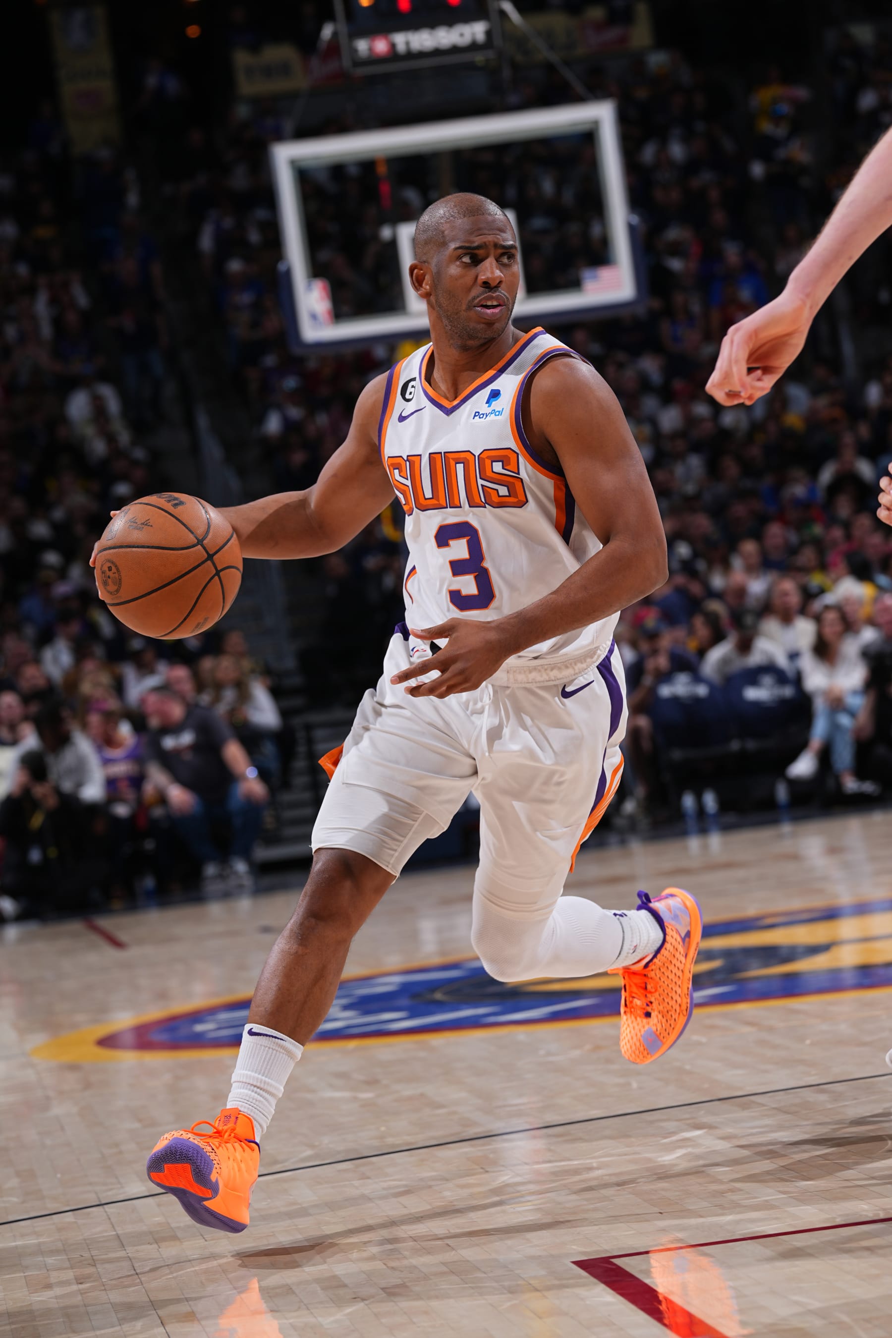DENVER, CO - APRIL 29: Chris Paul #3 of the Phoenix Suns dribbles the ball during Game One of the Western Conference Semi-Finals of the 2023 NBA Playoffs aDenver Nuggets on April 29, 2023 at the Ball Arena in Denver, Colorado. NOTE TO USER: User expressly acknowledges and agrees that, by downloading and/or using this Photograph, user is consenting to the terms and conditions of the Getty Images License Agreement. Mandatory Copyright Notice: Copyright 2023 NBAE (Photo by Bart Young/NBAE via Getty Images)