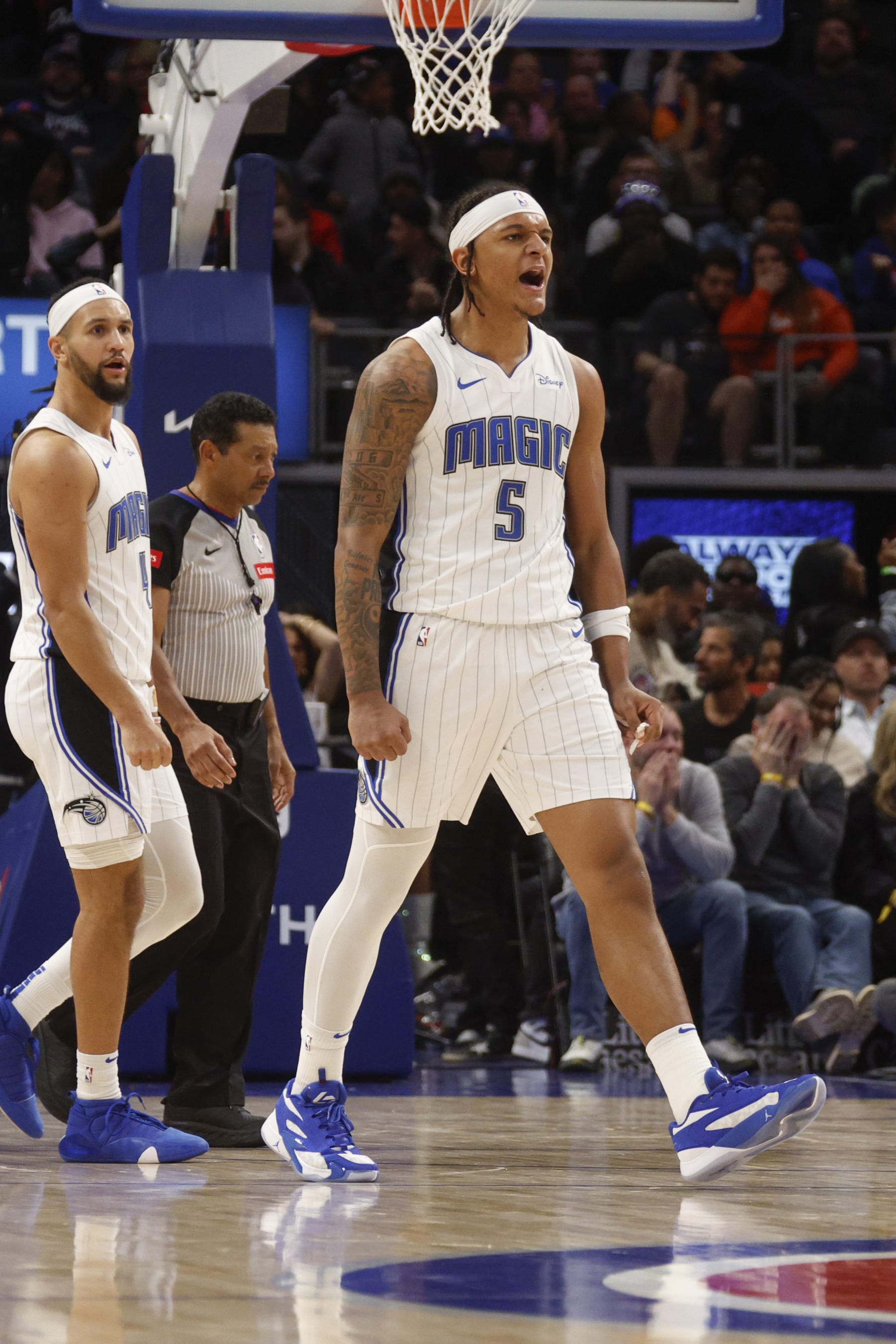 DETROIT, MI - FEBRUARY 24: Paolo Banchero #5 of the Orlando Magic celebrates during the game  on February 24, 2024 at Little Caesars Arena in Detroit, Michigan. NOTE TO USER: User expressly acknowledges and agrees that, by downloading and/or using this photograph, User is consenting to the terms and conditions of the Getty Images License Agreement. Mandatory Copyright Notice: Copyright 2024 NBAE (Photo by Brian Sevald/NBAE via Getty Images)