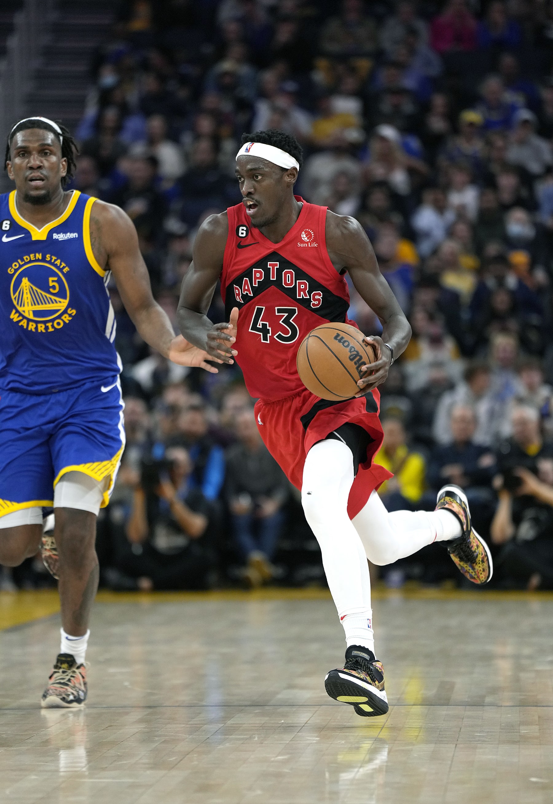 SAN FRANCISCO, CALIFORNIA - JANUARY 27: Pascal Siakam #43 of the Toronto Raptors dribbles the ball up court against the Golden State Warriors during the second quarter of an NBA basketball game at Chase Center on January 27, 2023 in San Francisco, California. NOTE TO USER: User expressly acknowledges and agrees that, by downloading and or using this photograph, User is consenting to the terms and conditions of the Getty Images License Agreement. (Photo by Thearon W. Henderson/Getty Images)