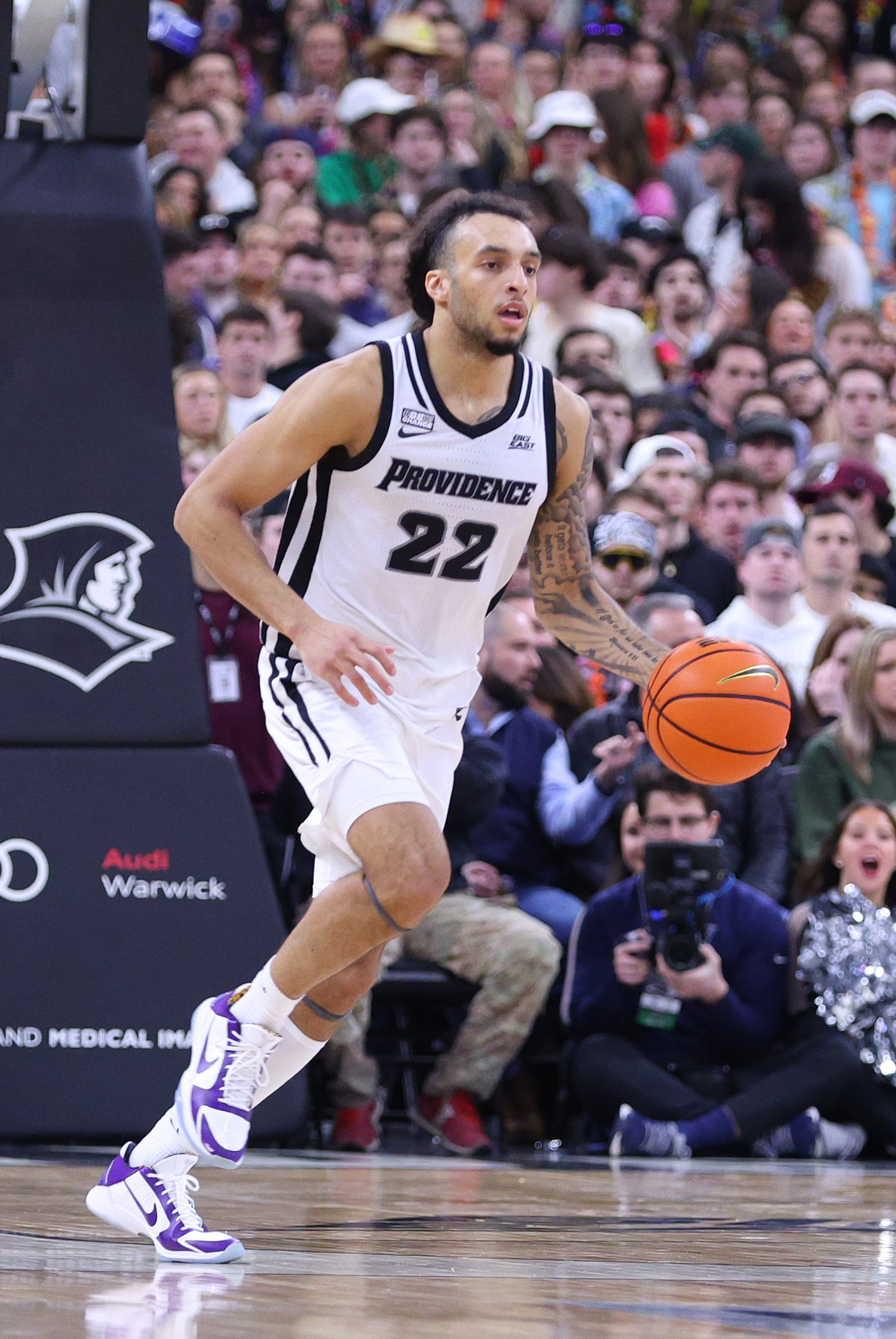 PROVIDENCE, RI - MARCH 02: Providence Friars guard Devin Carter (22) fast breaks during a college basketball game between Villanova Wildcats and Providence Friars on March 2, 2024, at Amica Mutual Pavilion in Providence, RI.  (Photo by M. Anthony Nesmith/Icon Sportswire via Getty Images)