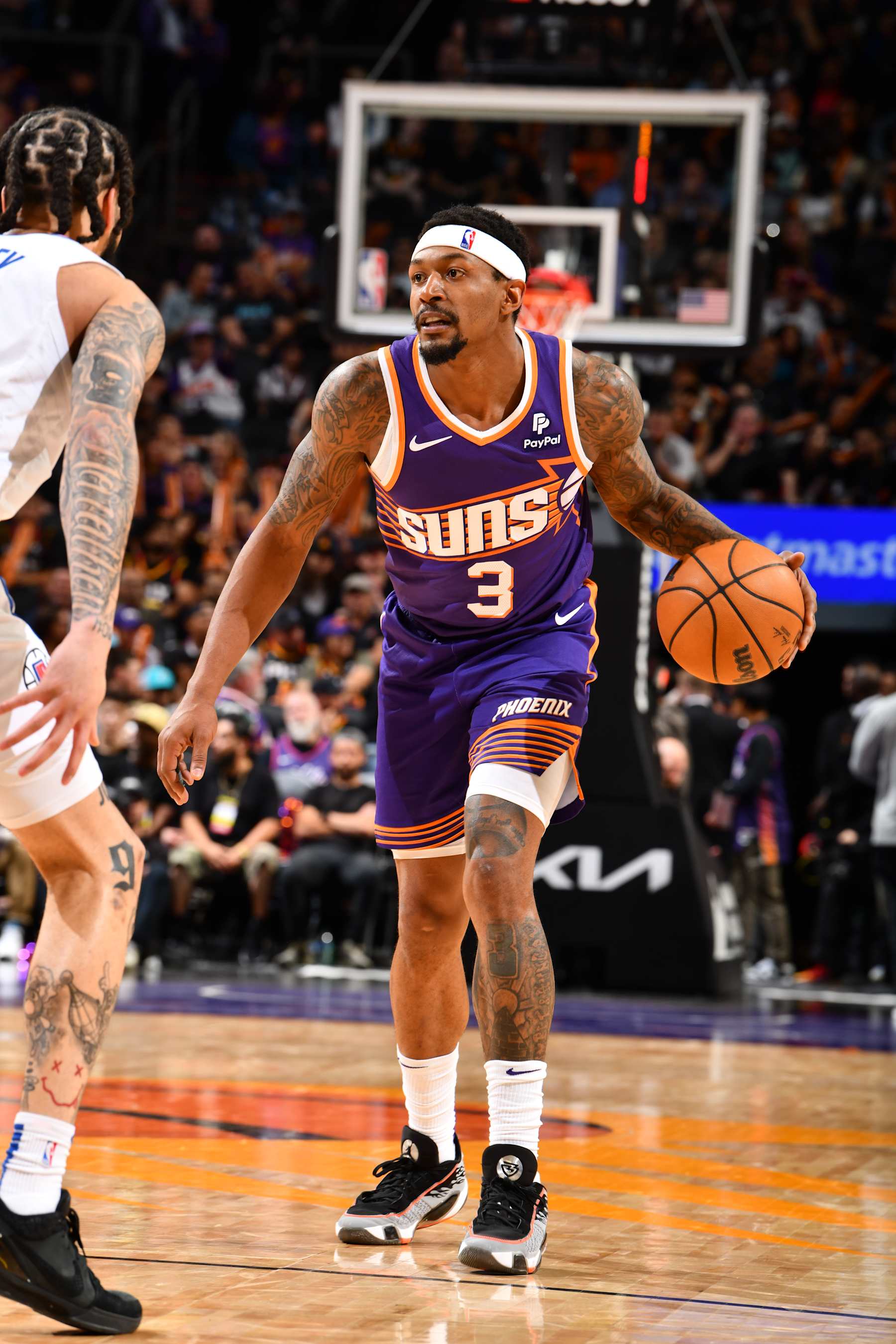 PHOENIX, AZ - APRIL 9:  Bradley Beal #3 of the Phoenix Suns handles the ball during the game on April 9, 2024 at Footprint Center in Phoenix, Arizona. NOTE TO USER: User expressly acknowledges and agrees that, by downloading and or using this photograph, user is consenting to the terms and conditions of the Getty Images License Agreement. Mandatory Copyright Notice: Copyright 2024 NBAE (Photo by Barry Gossage/NBAE via Getty Images)