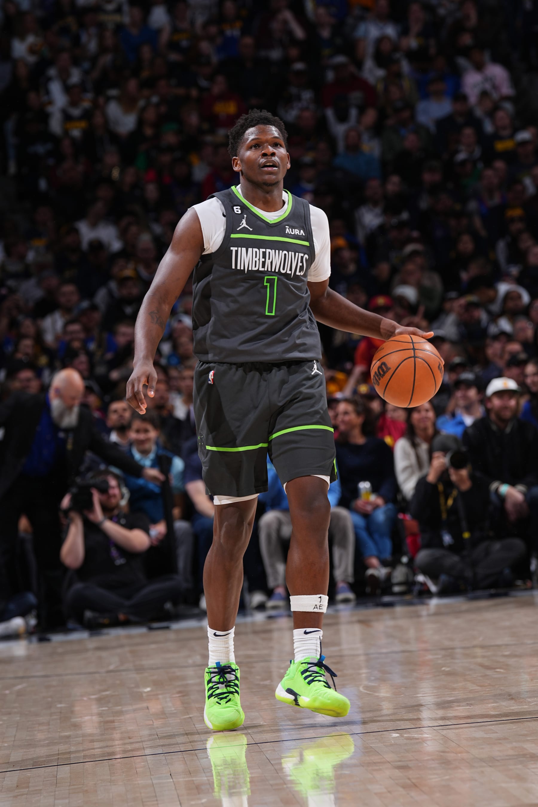 DENVER, CO - APRIL 25: Anthony Edwards #1 of the Minnesota Timberwolves dribbles the ball during Round One Game Five of the 2023 NBA Playoffs against the Denver Nuggets on April 25, 2023 at the Ball Arena in Denver, Colorado. NOTE TO USER: User expressly acknowledges and agrees that, by downloading and/or using this Photograph, user is consenting to the terms and conditions of the Getty Images License Agreement. Mandatory Copyright Notice: Copyright 2023 NBAE (Photo by Bart Young/NBAE via Getty Images)