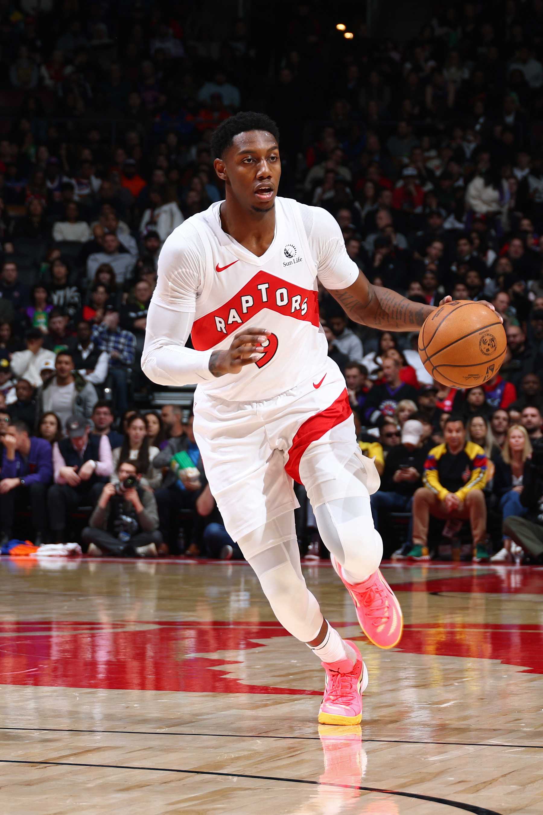TORONTO, CANADA - DECEMBER 9: RJ Barrett #9 of the Toronto Raptors handles the ball during the game against the New York Knicks on December 9, 2024 at the Scotiabank Arena in Toronto, Ontario, Canada.  NOTE TO USER: User expressly acknowledges and agrees that, by downloading and or using this Photograph, user is consenting to the terms and conditions of the Getty Images License Agreement.  Mandatory Copyright Notice: Copyright 2024 NBAE (Photo by Vaughn Ridley/NBAE via Getty Images)