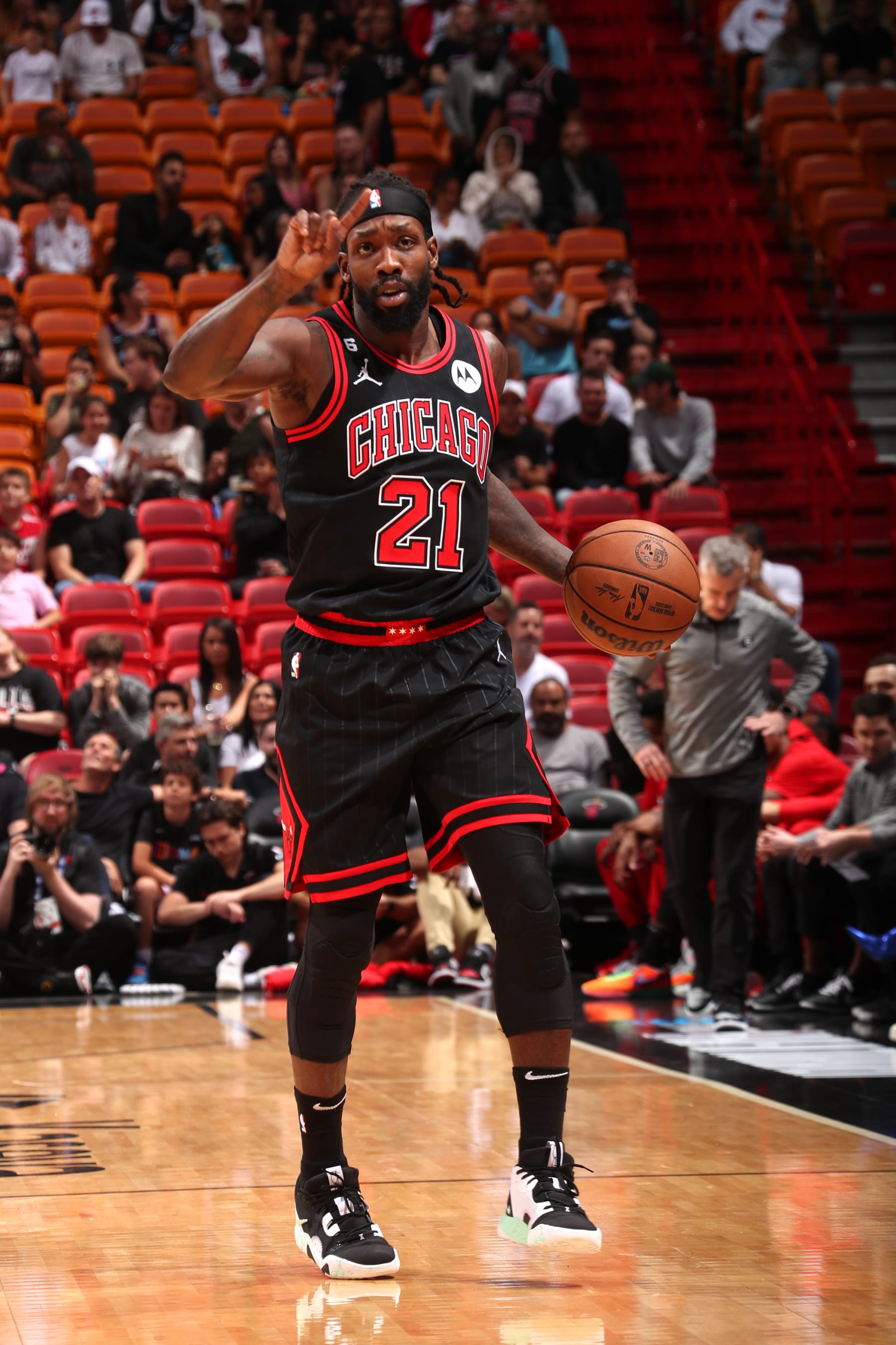 MIAMI, FL - APRIL 14: Patrick Beverley #21 of the Chicago Bulls dribbles the ball during the game against the Miami Heat during the 2023 Play-In Tournament on April 14, 2023 at the Kaseya Center in Miami, Florida. NOTE TO USER: User expressly acknowledges and agrees that, by downloading and or using this Photograph, user is consenting to the terms and conditions of the Getty Images License Agreement. Mandatory Copyright Notice: Copyright 2023 NBAE (Photo by Issac Baldizon/NBAE via Getty Images)