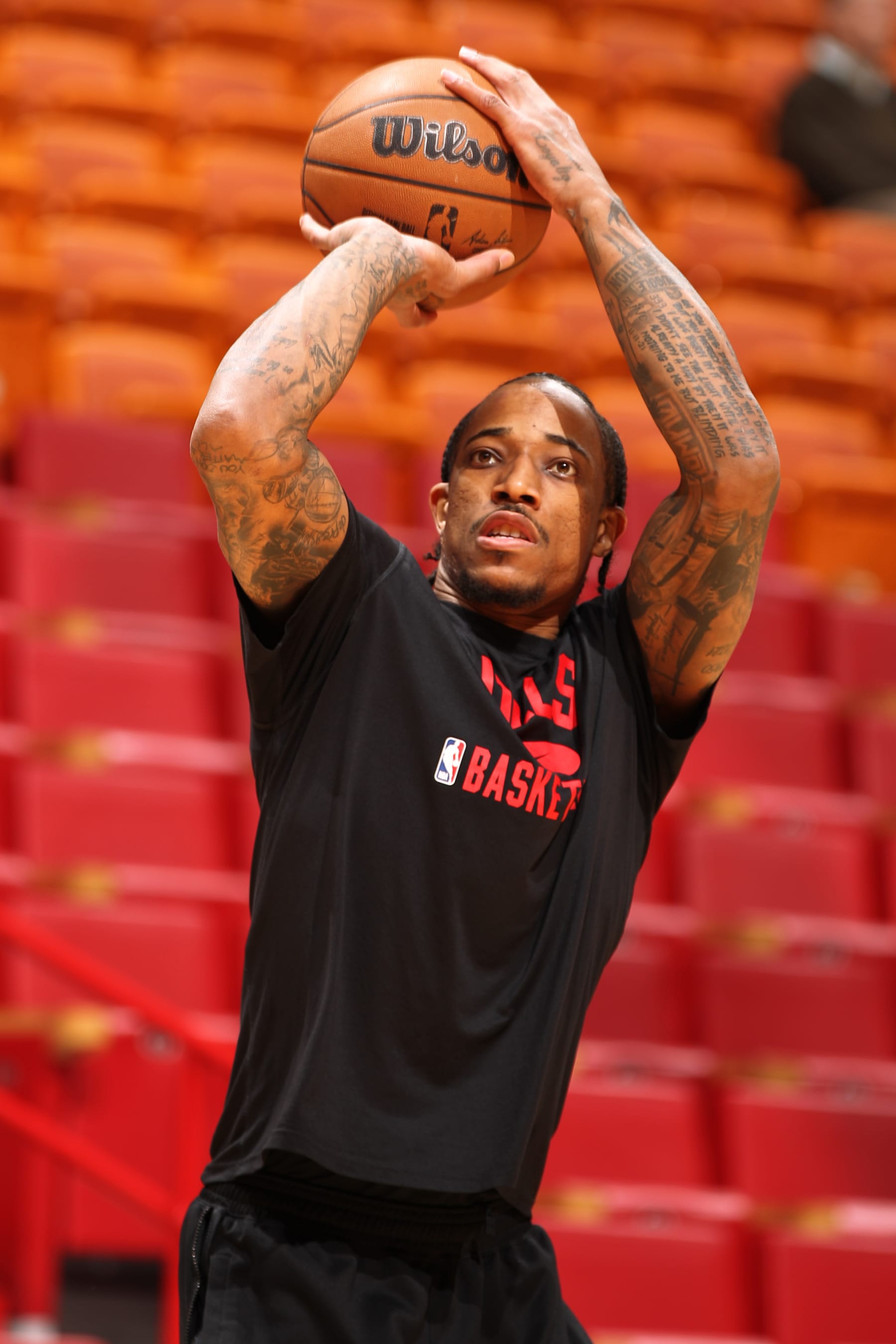 MIAMI, FL - APRIL 14: DeMar DeRozan #11 of the Chicago Bulls warms up before the game against the Miami Heat during the 2023 Play-In Tournament on April 14, 2023 at the Kaseya Center in Miami, Florida. NOTE TO USER: User expressly acknowledges and agrees that, by downloading and or using this Photograph, user is consenting to the terms and conditions of the Getty Images License Agreement. Mandatory Copyright Notice: Copyright 2023 NBAE (Photo by Issac Baldizon/NBAE via Getty Images)
