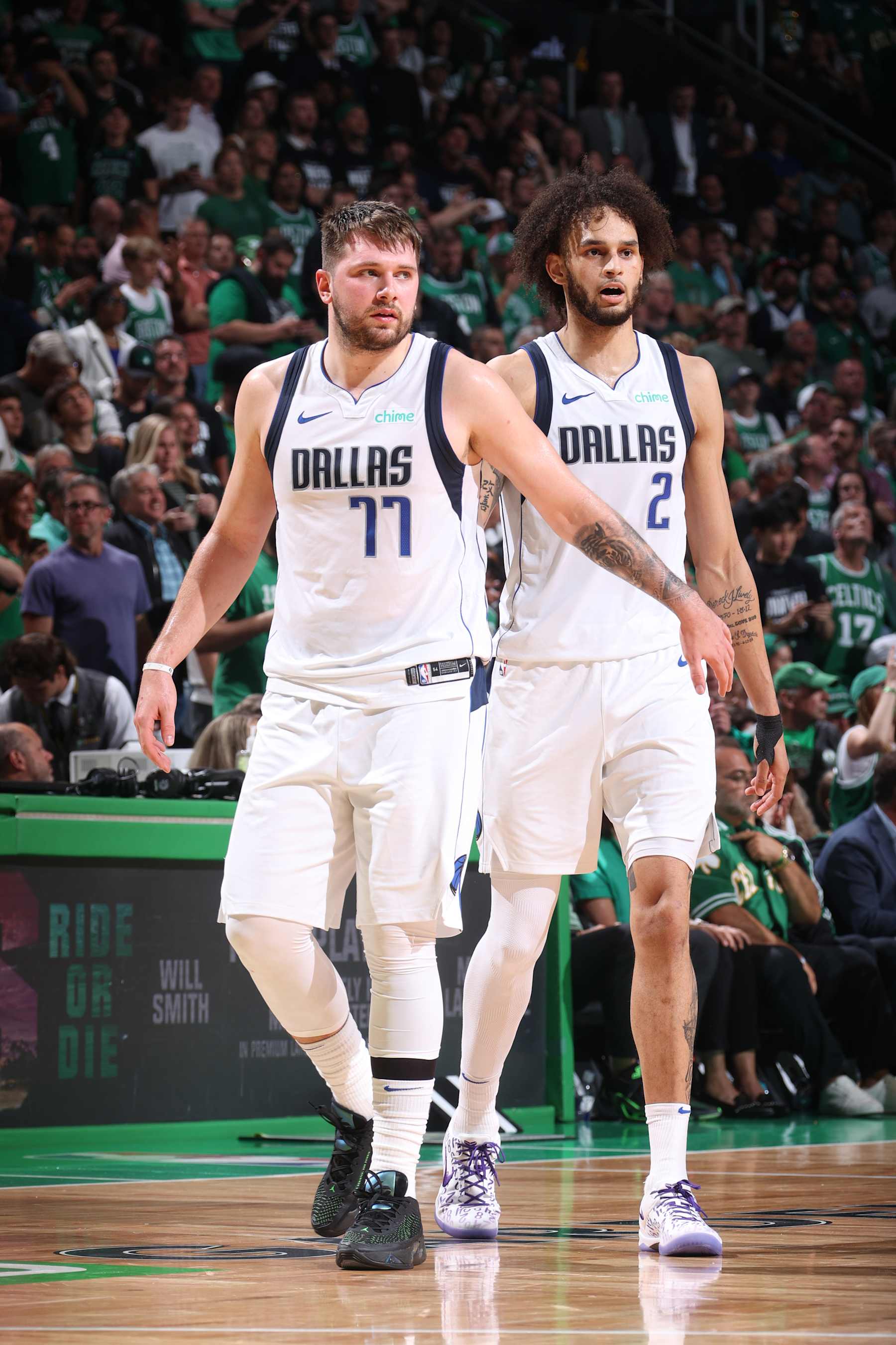 BOSTON, MA - JUNE 17: Luka Doncic #77 and Dereck Lively II #2 of the Dallas Mavericks look on during the game against the Boston Celtics during Game 5 of the 2024 NBA Finals on June 17, 2024 at the TD Garden in Boston, Massachusetts. NOTE TO USER: User expressly acknowledges and agrees that, by downloading and or using this photograph, User is consenting to the terms and conditions of the Getty Images License Agreement. Mandatory Copyright Notice: Copyright 2024 NBAE  (Photo by Nathaniel S. Butler/NBAE via Getty Images)