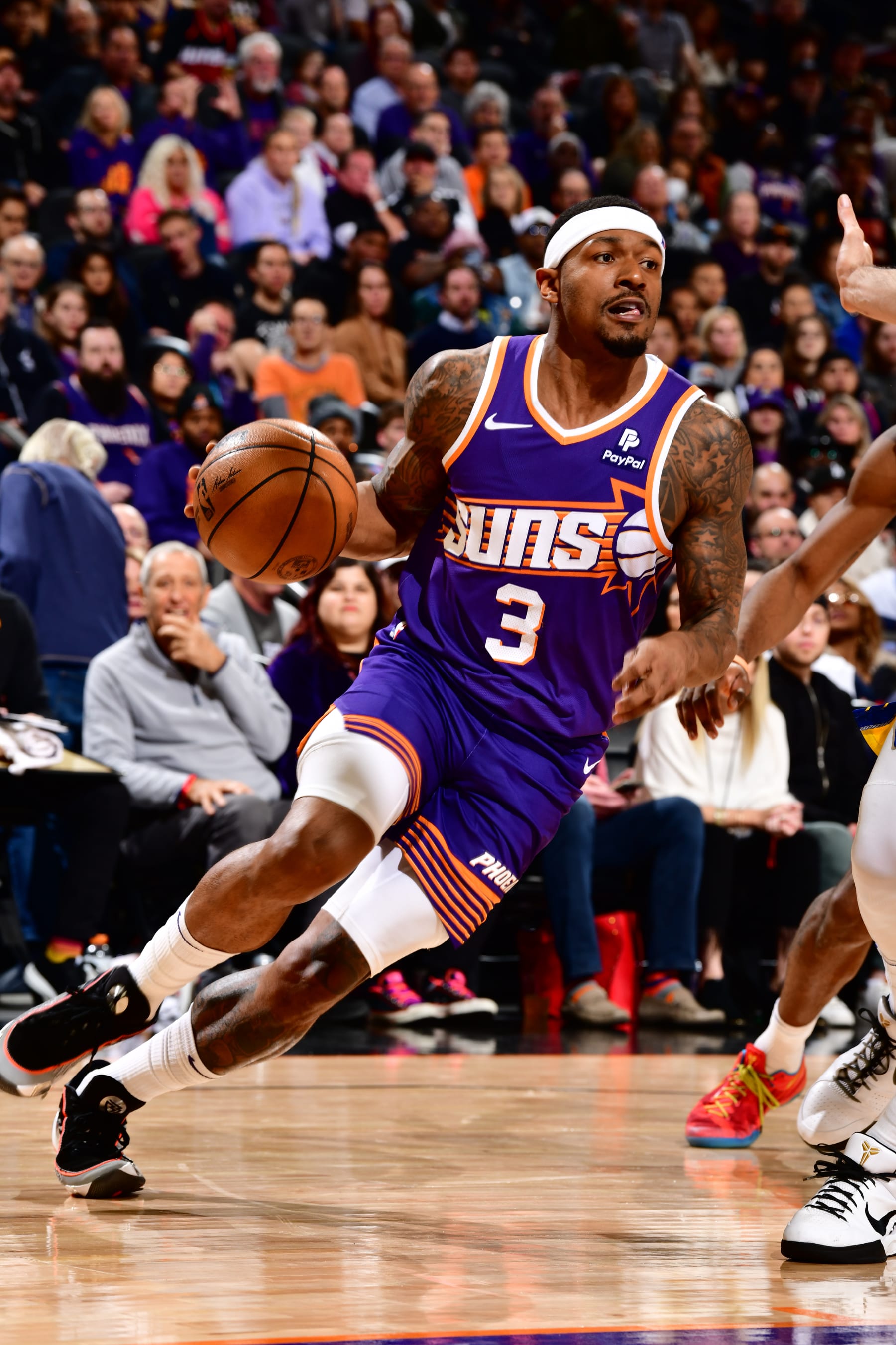 PHOENIX, AZ - DECEMBER 12: Bradley Beal #3 of the Phoenix Suns dribbles the ball during the game against the Golden State Warriors on December 12, 2023 at Footprint Center in Phoenix, Arizona. NOTE TO USER: User expressly acknowledges and agrees that, by downloading and or using this photograph, user is consenting to the terms and conditions of the Getty Images License Agreement. Mandatory Copyright Notice: Copyright 2023 NBAE (Photo by Barry Gossage/NBAE via Getty Images)
