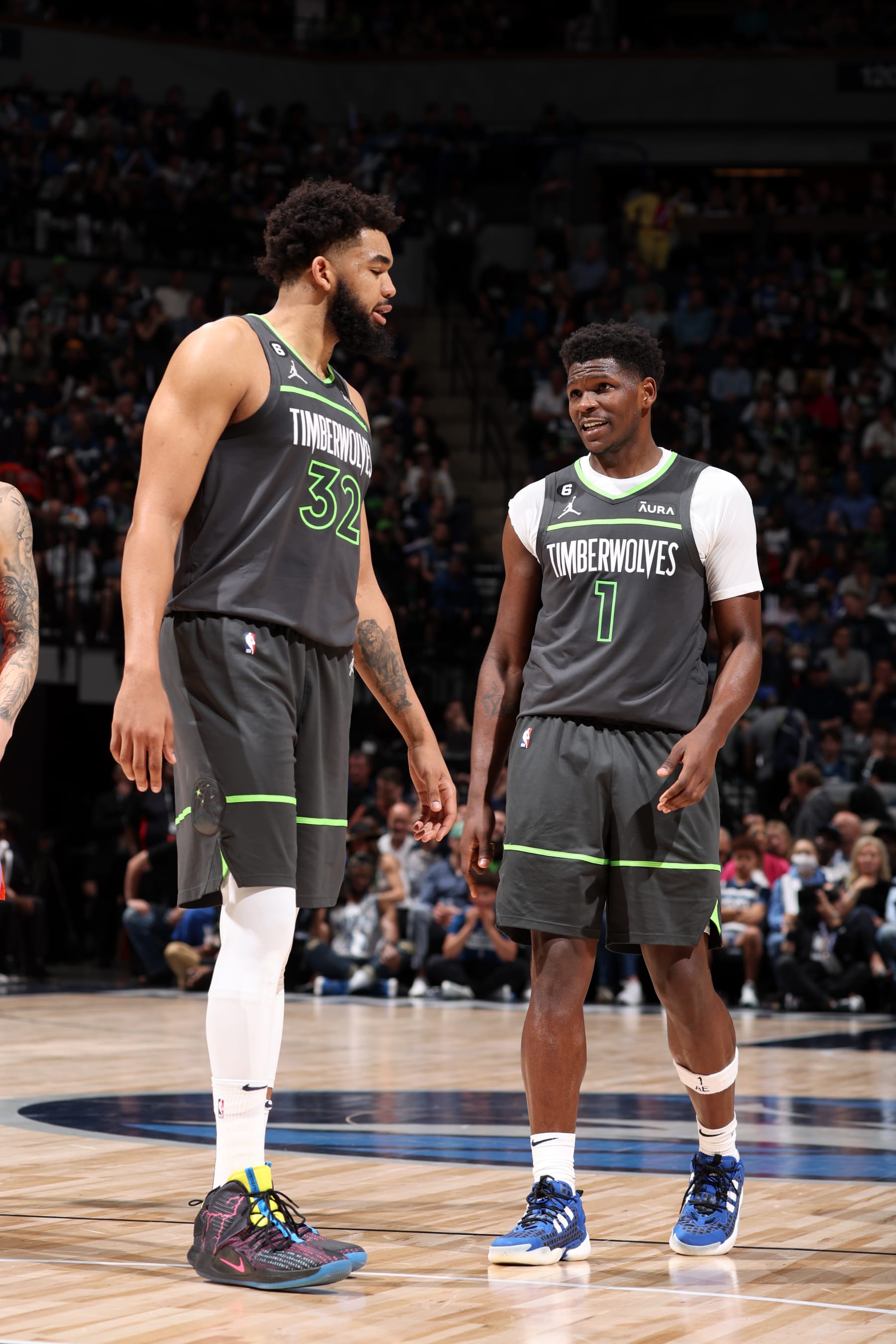 MINNEAPOLIS, MN -  APRIL 14: Karl-Anthony Towns #32 of the Minnesota Timberwolves talks with Anthony Edwards #1 of the Minnesota Timberwolves during the game against the Oklahoma City Thunder during the 2023 Play-In Tournament on April 14, 2023 at Target Center in Minneapolis, Minnesota. NOTE TO USER: User expressly acknowledges and agrees that, by downloading and or using this Photograph, user is consenting to the terms and conditions of the Getty Images License Agreement. Mandatory Copyright Notice: Copyright 2023 NBAE (Photo by David Sherman/NBAE via Getty Images)
