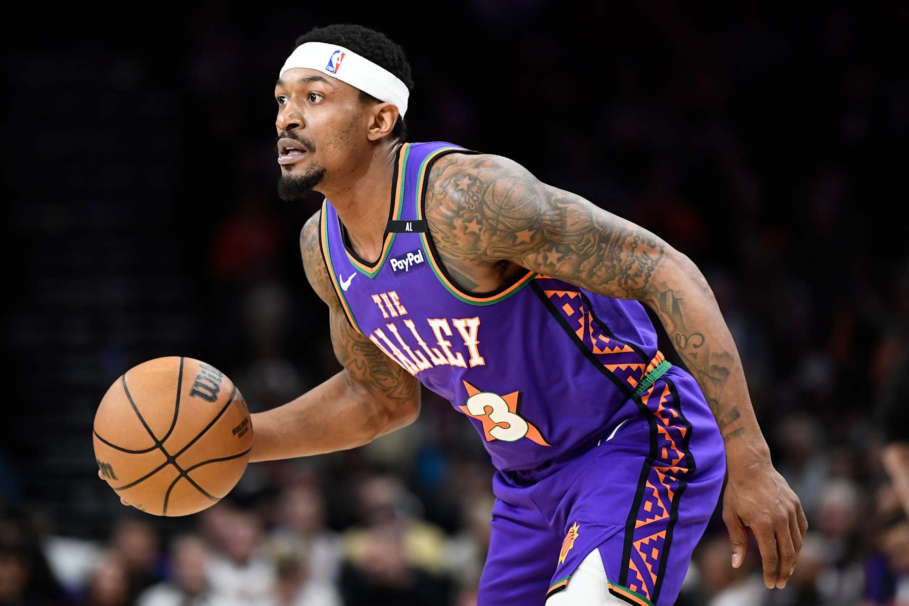 PHOENIX, ARIZONA - JANUARY 11: Bradley Beal #3 of the Phoenix Suns controls the ball during the first half of the NBA game against the Utah Jazz  at Footprint Center on January 11, 2025 in Phoenix, Arizona. NOTE TO USER: User expressly acknowledges and agrees that, by downloading and or using this photograph, User is consenting to the terms and conditions of the Getty Images License Agreement. (Photo by Kelsey Grant/Getty Images)