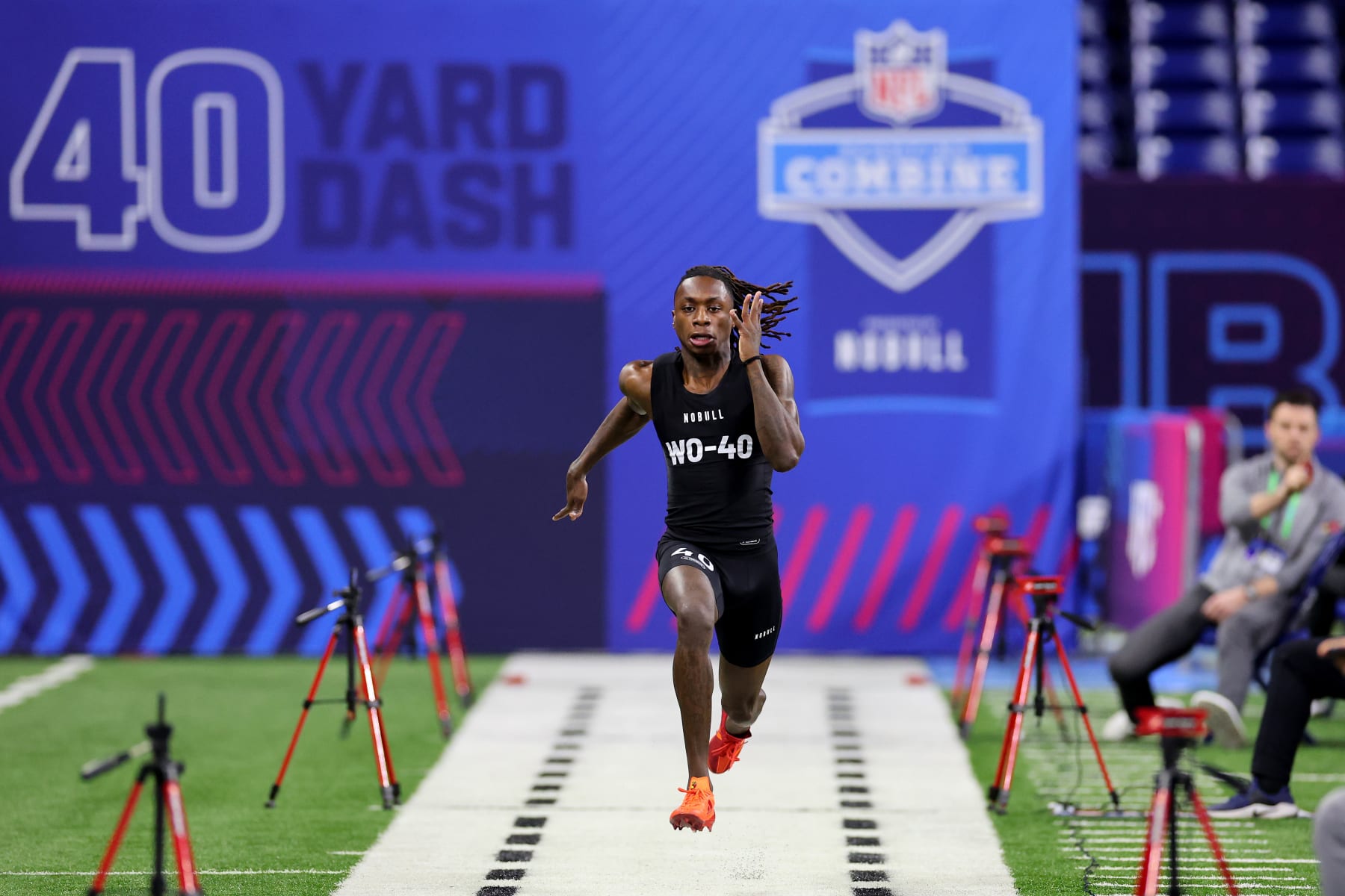 INDIANAPOLIS, INDIANA - MARCH 02: Xavier Worthy #WO40 of Texas participates in the 40-yard dash during the NFL Combine at Lucas Oil Stadium on March 02, 2024 in Indianapolis, Indiana. (Photo by Stacy Revere/Getty Images)