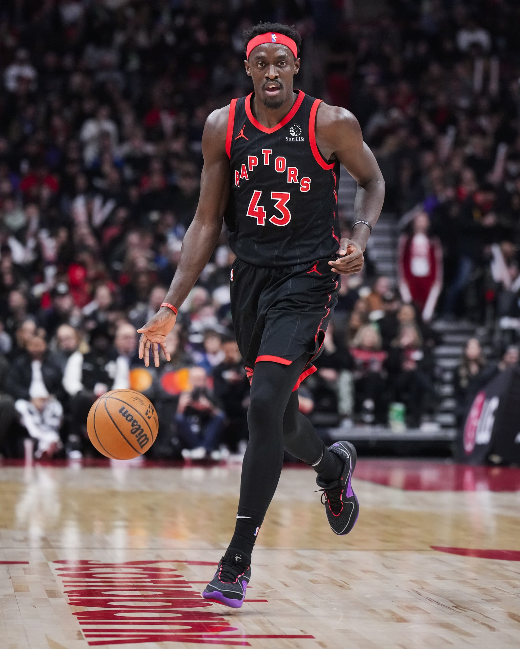 TORONTO, ON - DECEMBER 23: Pascal Siakam #43 of the Toronto Raptors dribbles against the Utah Jazz during the first half of their basketball game at the Scotiabank Arena on December 23, 2023 in Toronto, Ontario, Canada. NOTE TO USER: User expressly acknowledges and agrees that, by downloading and/or using this Photograph, user is consenting to the terms and conditions of the Getty Images License Agreement. (Photo by Mark Blinch/Getty Images)