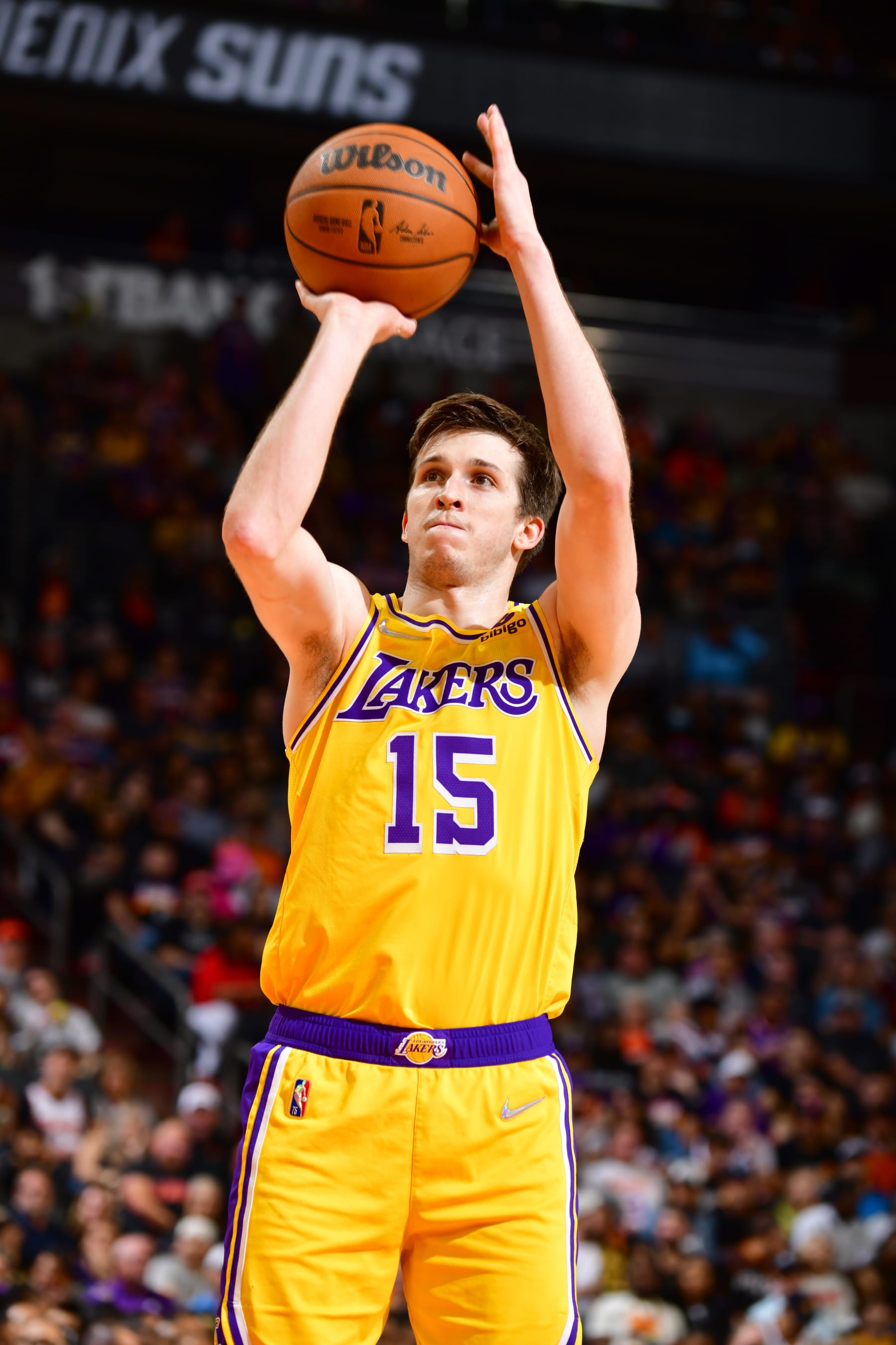 PHOENIX, AZ - APRIL 5: Austin Reaves #15 of the Los Angeles Lakers shoots a free throw during the game against the Phoenix Suns on April 5, 2022 at Footprint Center in Phoenix, Arizona. NOTE TO USER: User expressly acknowledges and agrees that, by downloading and or using this photograph, user is consenting to the terms and conditions of the Getty Images License Agreement. Mandatory Copyright Notice: Copyright 2022 NBAE (Photo by Barry Gossage/NBAE via Getty Images)