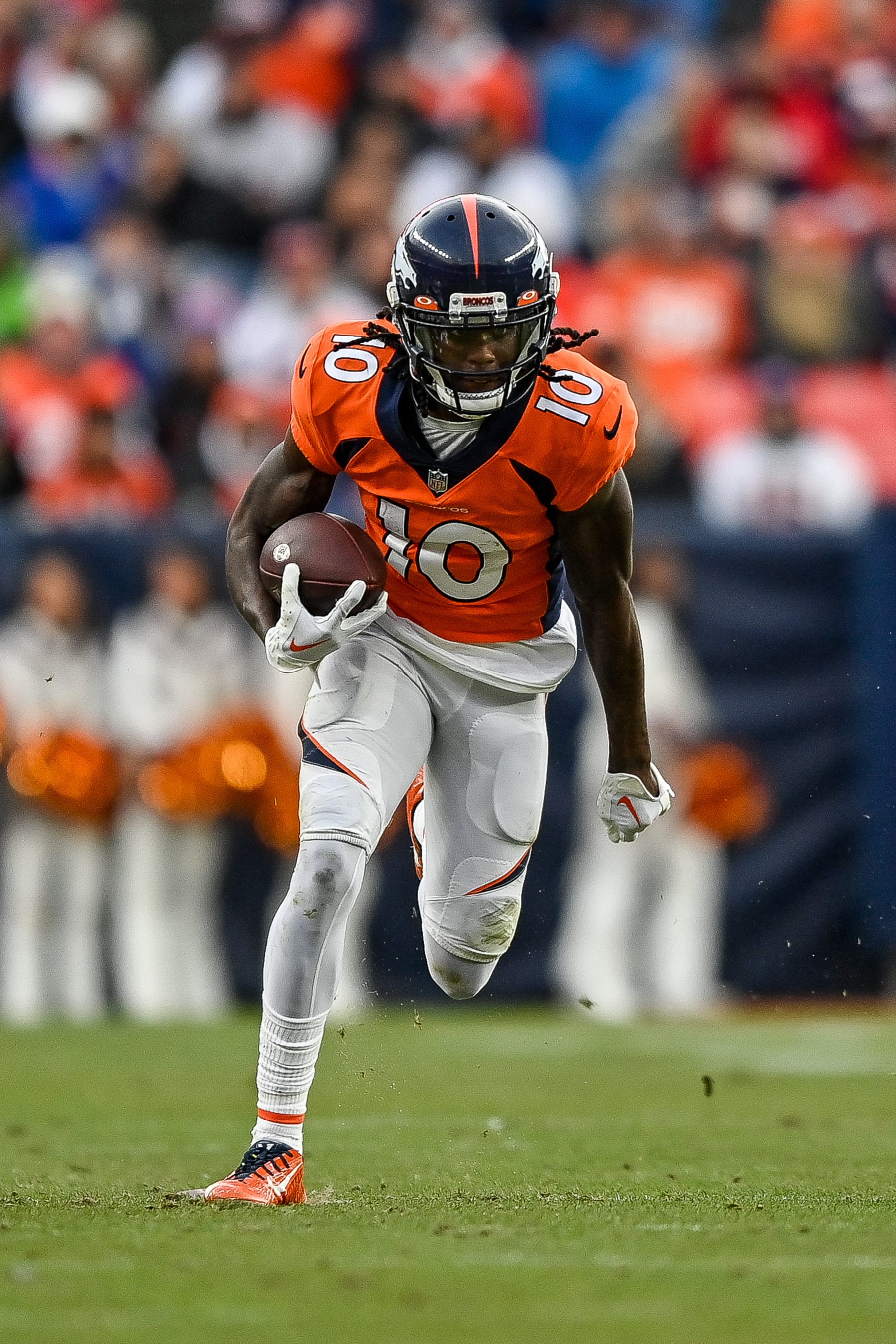 DENVER, CO - JANUARY 8: Denver Broncos wide receiver Jerry Jeudy (10) runs after a catch during a game between the Los Angeles Chargers and the Denver Broncos at Empower Field at Mile High on January 8, 2023 in Denver, Colorado. (Photo by Dustin Bradford/Icon Sportswire via Getty Images)