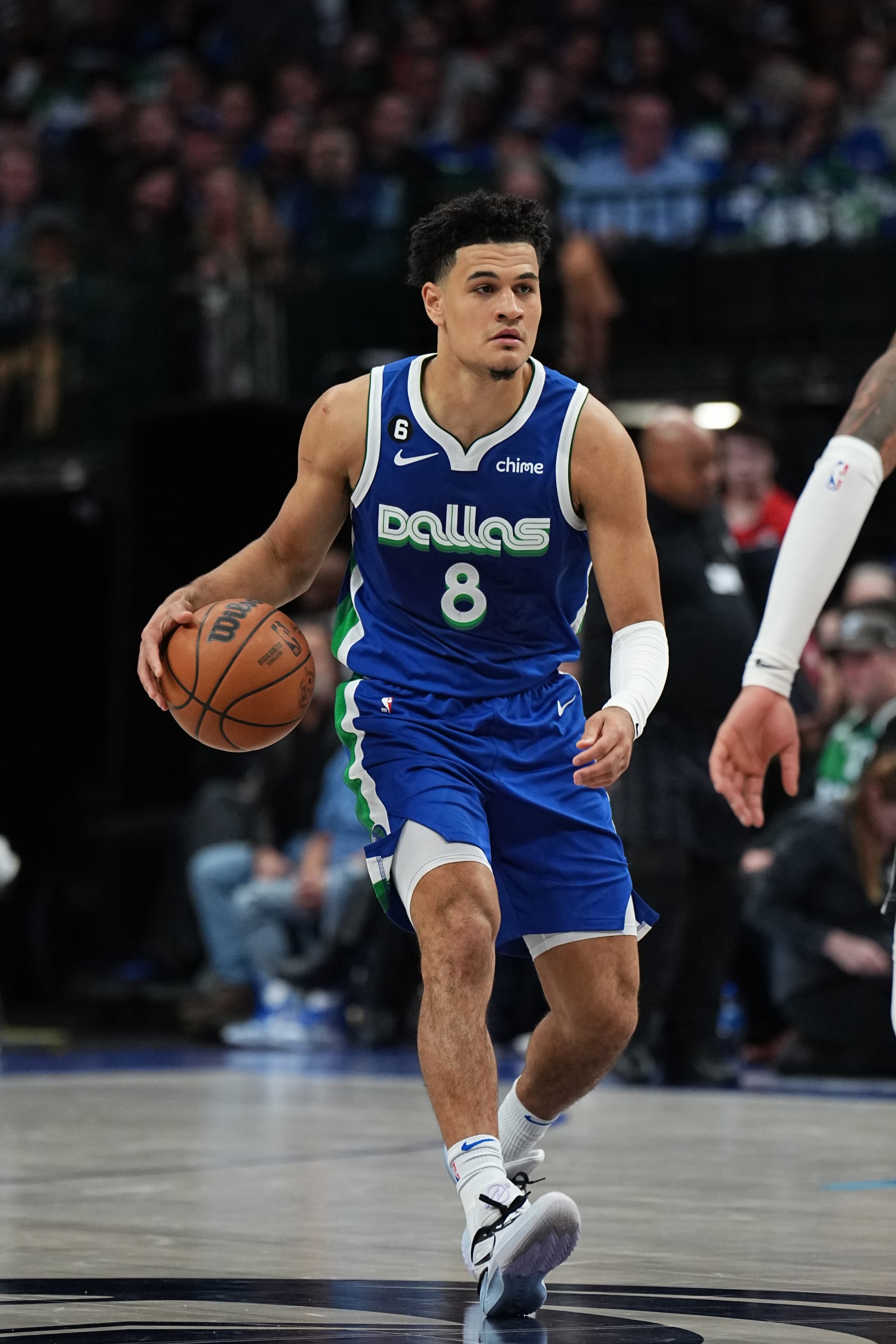 DALLAS, TX - NOVEMBER 12: Josh Green #8 of the Dallas Mavericks handles the ball during the game against the Portland Trail Blazers on November 12, 2022 at the American Airlines Center in Dallas, Texas. NOTE TO USER: User expressly acknowledges and agrees that, by downloading and or using this photograph, User is consenting to the terms and conditions of the Getty Images License Agreement. Mandatory Copyright Notice: Copyright 2022 NBAE (Photo by Glenn James/NBAE via Getty Images)