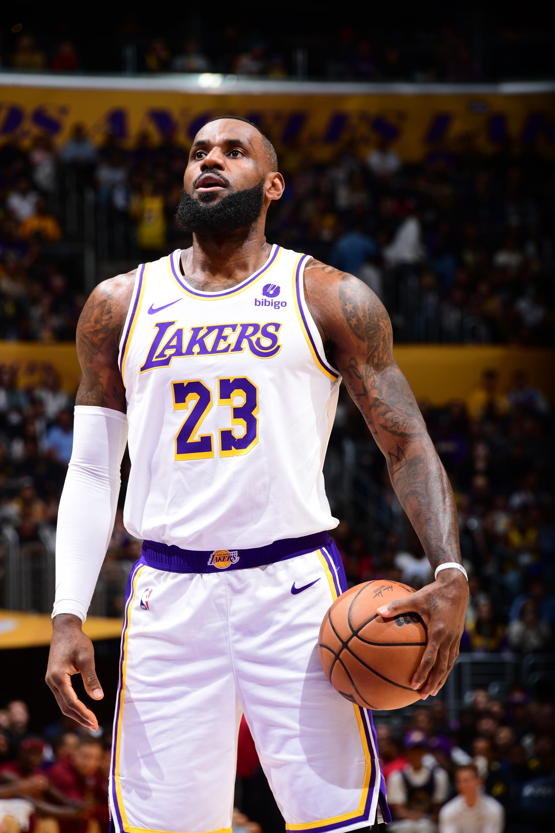 LOS ANGELES, CA - APRIL 6: LeBron James #23 of the Los Angeles Lakers shoots a free throw during the game against the Cleveland Cavaliers on April 6, 2024 at Crypto.Com Arena in Los Angeles, California. NOTE TO USER: User expressly acknowledges and agrees that, by downloading and/or using this Photograph, user is consenting to the terms and conditions of the Getty Images License Agreement. Mandatory Copyright Notice: Copyright 2024 NBAE (Photo by Adam Pantozzi/NBAE via Getty Images)