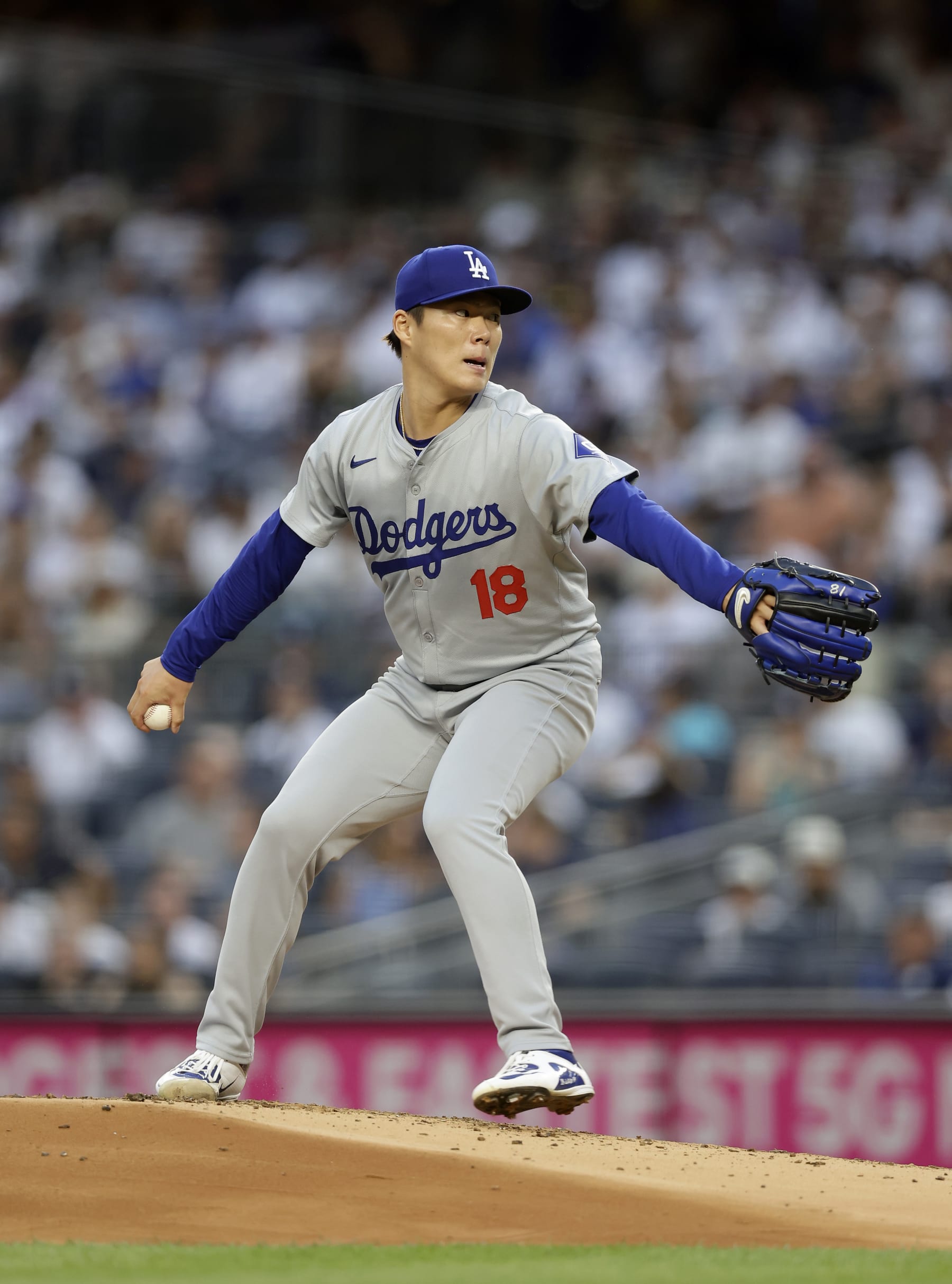 NEW YORK, NEW YORK - JUNE 07:  Yoshinobu Yamamoto #18 of the Los Angeles Dodgers in action against the New York Yankees at Yankee Stadium on June 07, 2024 in New York City. The Dodgers defeated the Yankees 2-1 in eleven innings. (Photo by Jim McIsaac/Getty Images)