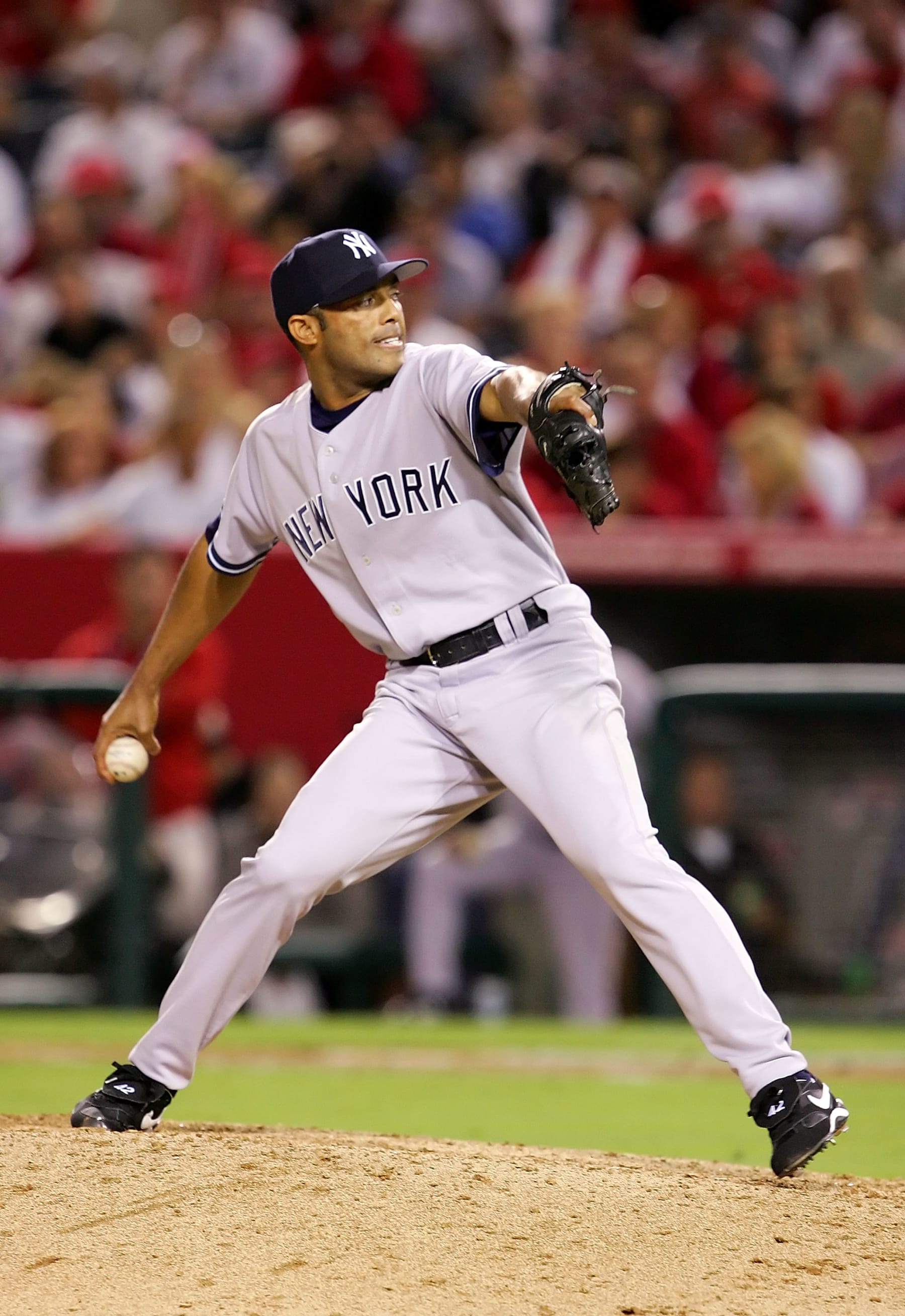 ANAHEIM, CA - OCTOBER 04:  Mariano Rivera #42 of the New York Yankees pitches in the ninth inning to the Los Angeles Angels of Anaheim during Game One of the American League Division Series on October 4, 2005 at Angel Stadium in Anaheim, California.  The Yankees defeated the Angels 4-2.  (Photo by Lisa Blumenfeld/Getty Images)