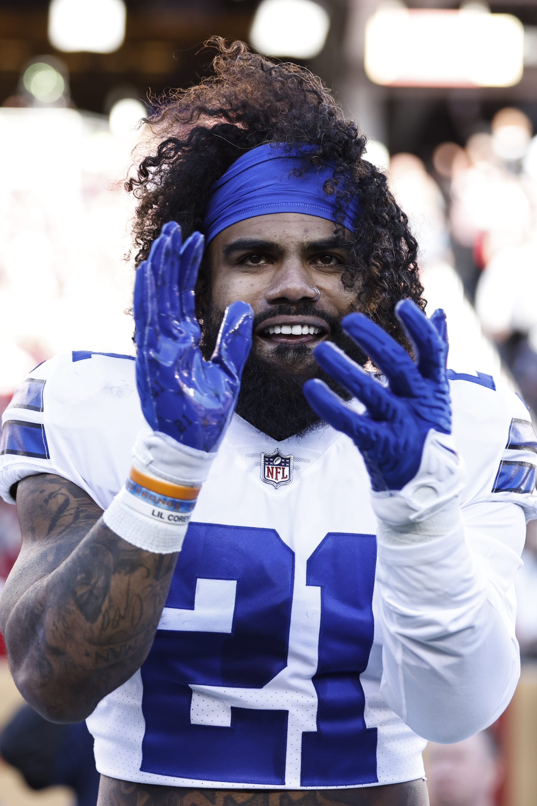 SANTA CLARA, CALIFORNIA - JANUARY 22: Ezekiel Elliott #21 of the Dallas Cowboys reacts during an NFL divisional round playoff football game between the San Francisco 49ers and the Dallas Cowboys at Levi's Stadium on January 22, 2023 in Santa Clara, California. (Photo by Michael Owens/Getty Images)