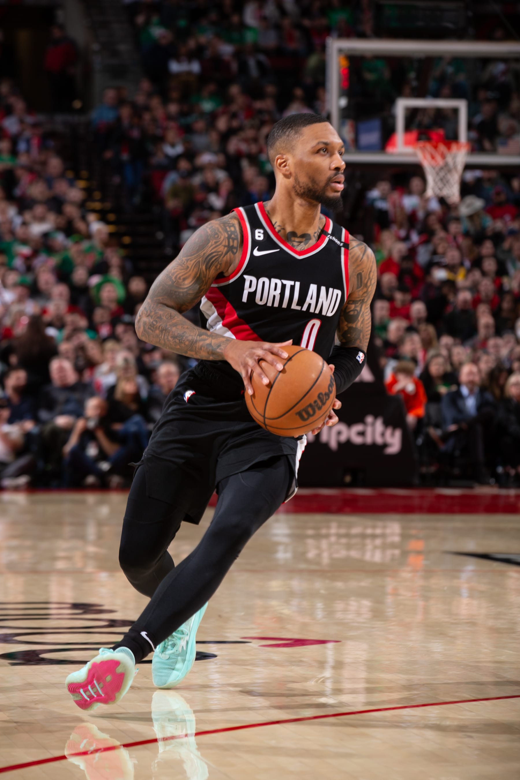 PORTLAND, OR - MARCH 17:  Damian Lillard #0 of the Portland Trail Blazers goes to the basket during the game on March 17, 2023 at the Moda Center Arena in Portland, Oregon. NOTE TO USER: User expressly acknowledges and agrees that, by downloading and or using this photograph, user is consenting to the terms and conditions of the Getty Images License Agreement. Mandatory Copyright Notice: Copyright 2023 NBAE (Photo by Cameron Browne/NBAE via Getty Images)