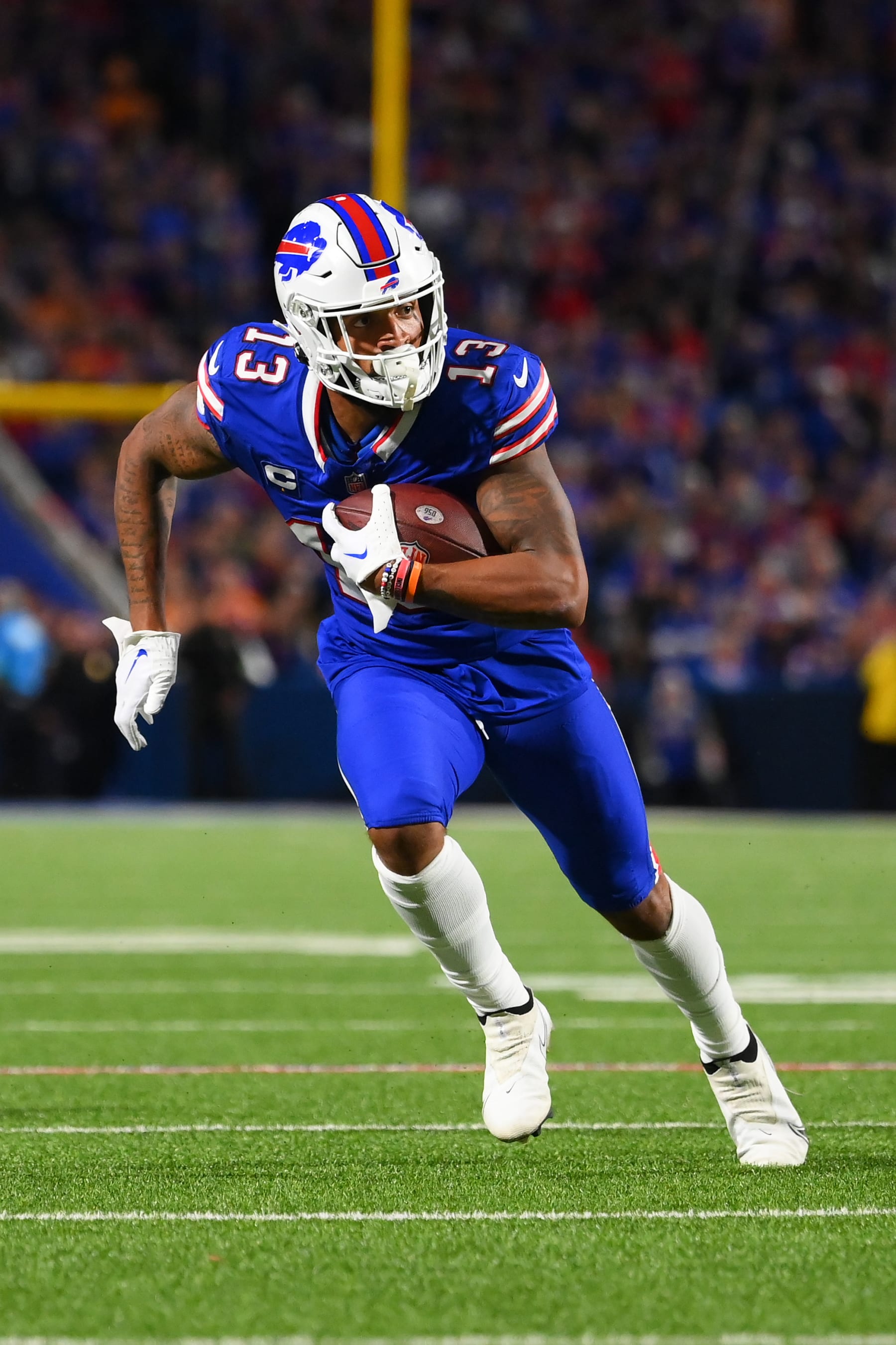 ORCHARD PARK, NEW YORK - OCTOBER 26: Gabe Davis #13 of the Buffalo Bills runs with the ball after a catch against the Tampa Bay Buccaneers during the second half at Highmark Stadium on October 26, 2023 in Orchard Park, New York. (Photo by Rich Barnes/Getty Images)
