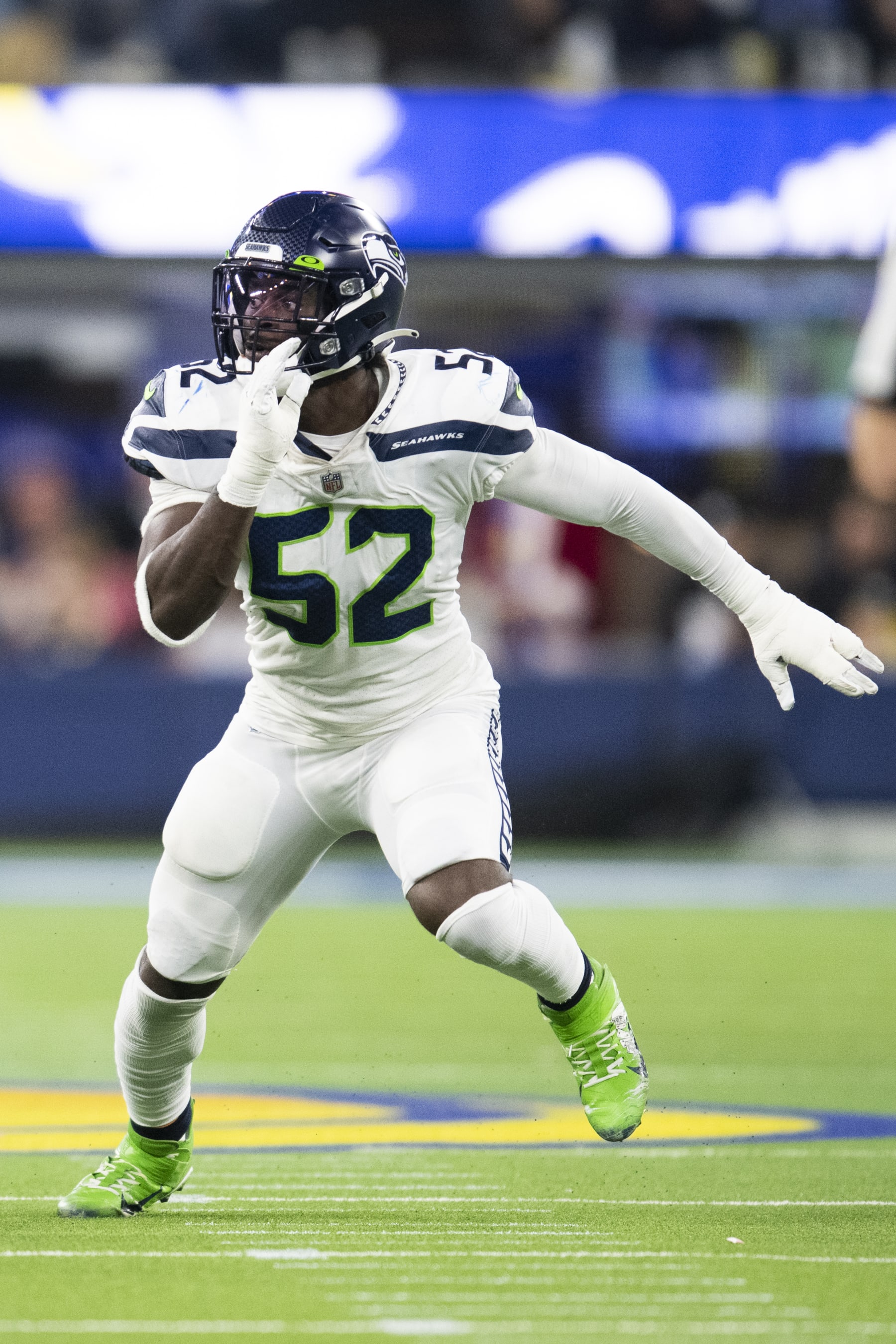 Seattle Seahawks defensive end Darrell Taylor (52) runs during an NFL football game against the Los Angeles Rams Tuesday, Dec. 21, 2021, in Inglewood, Calif. (AP Photo/Kyusung Gong)