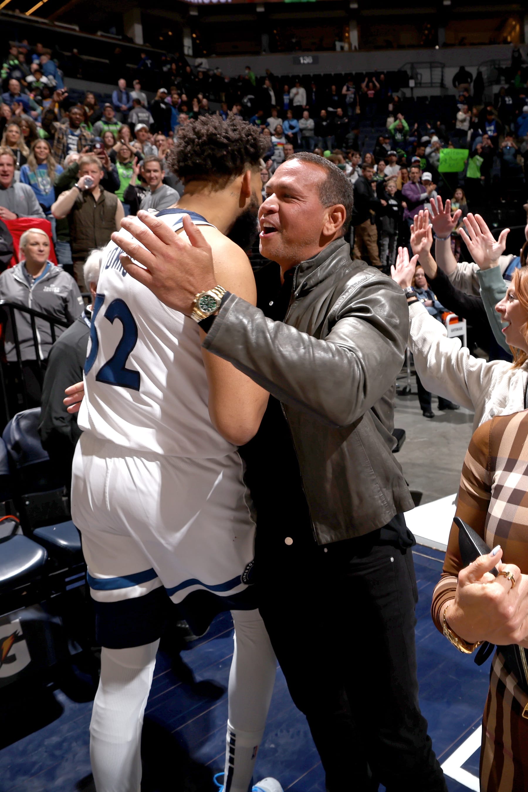 MINNEAPOLIS, MN -  MARCH 22: Alex Rodriguez congratulates Karl-Anthony Towns #32 of the Minnesota Timberwolves after the game against the Atlanta Hawks on March 22, 2023 at Target Center in Minneapolis, Minnesota. NOTE TO USER: User expressly acknowledges and agrees that, by downloading and or using this Photograph, user is consenting to the terms and conditions of the Getty Images License Agreement. Mandatory Copyright Notice: Copyright 2023 NBAE (Photo by David Sherman/NBAE via Getty Images)